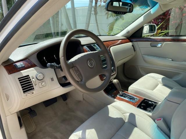 2006 Glacier White /Cashmere Cadillac DTS LOW MILES 58,287 (1G6KD57Y96U) with an 4.6L DOHC V8 Northstar Engine engine, Automatic transmission, located at 4701 North Dixie Hwy, Pompano Beach, FL, 33064, (954) 422-2889, 26.240938, -80.123474 - OUR WEBPAGE FLORIDACARS1.COM HAS OVER 100 PHOTOS AND FREE CARFAX LINK 2006 Cadillac DTS Sedan 4 DR 4.6L V8 F Gasoline 25 MPG Front Wheel Drive Features ABS Brakes Air Conditioning Alloy Wheels AM/FM Stereo Automatic Transmission Bluetooth Technology CD Audio Cruise Control Leather Seats Overhead Air- Photo#47
