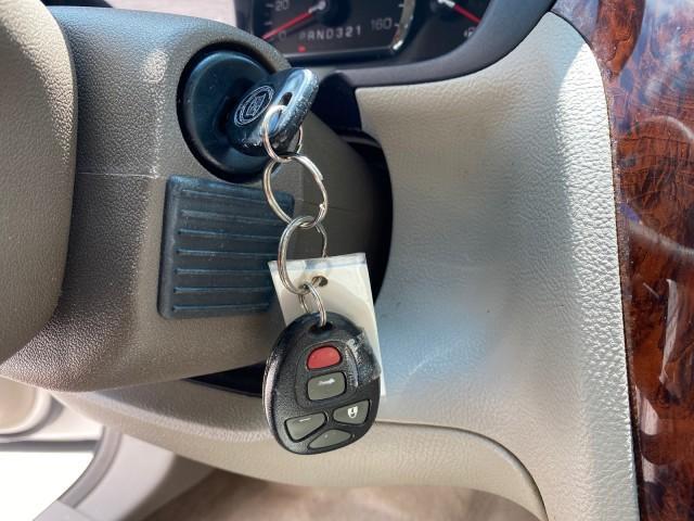2006 Glacier White /Cashmere Cadillac DTS LOW MILES 58,287 (1G6KD57Y96U) with an 4.6L DOHC V8 Northstar Engine engine, Automatic transmission, located at 4701 North Dixie Hwy, Pompano Beach, FL, 33064, (954) 422-2889, 26.240938, -80.123474 - OUR WEBPAGE FLORIDACARS1.COM HAS OVER 100 PHOTOS AND FREE CARFAX LINK 2006 Cadillac DTS Sedan 4 DR 4.6L V8 F Gasoline 25 MPG Front Wheel Drive Features ABS Brakes Air Conditioning Alloy Wheels AM/FM Stereo Automatic Transmission Bluetooth Technology CD Audio Cruise Control Leather Seats Overhead Air- Photo#56