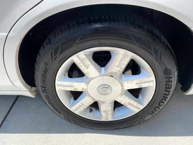 2006 Glacier White /Cashmere Cadillac DTS LOW MILES 58,287 (1G6KD57Y96U) with an 4.6L DOHC V8 Northstar Engine engine, Automatic transmission, located at 4701 North Dixie Hwy, Pompano Beach, FL, 33064, (954) 422-2889, 26.240938, -80.123474 - OUR WEBPAGE FLORIDACARS1.COM HAS OVER 100 PHOTOS AND FREE CARFAX LINK 2006 Cadillac DTS Sedan 4 DR 4.6L V8 F Gasoline 25 MPG Front Wheel Drive Features ABS Brakes Air Conditioning Alloy Wheels AM/FM Stereo Automatic Transmission Bluetooth Technology CD Audio Cruise Control Leather Seats Overhead Air- Photo#85