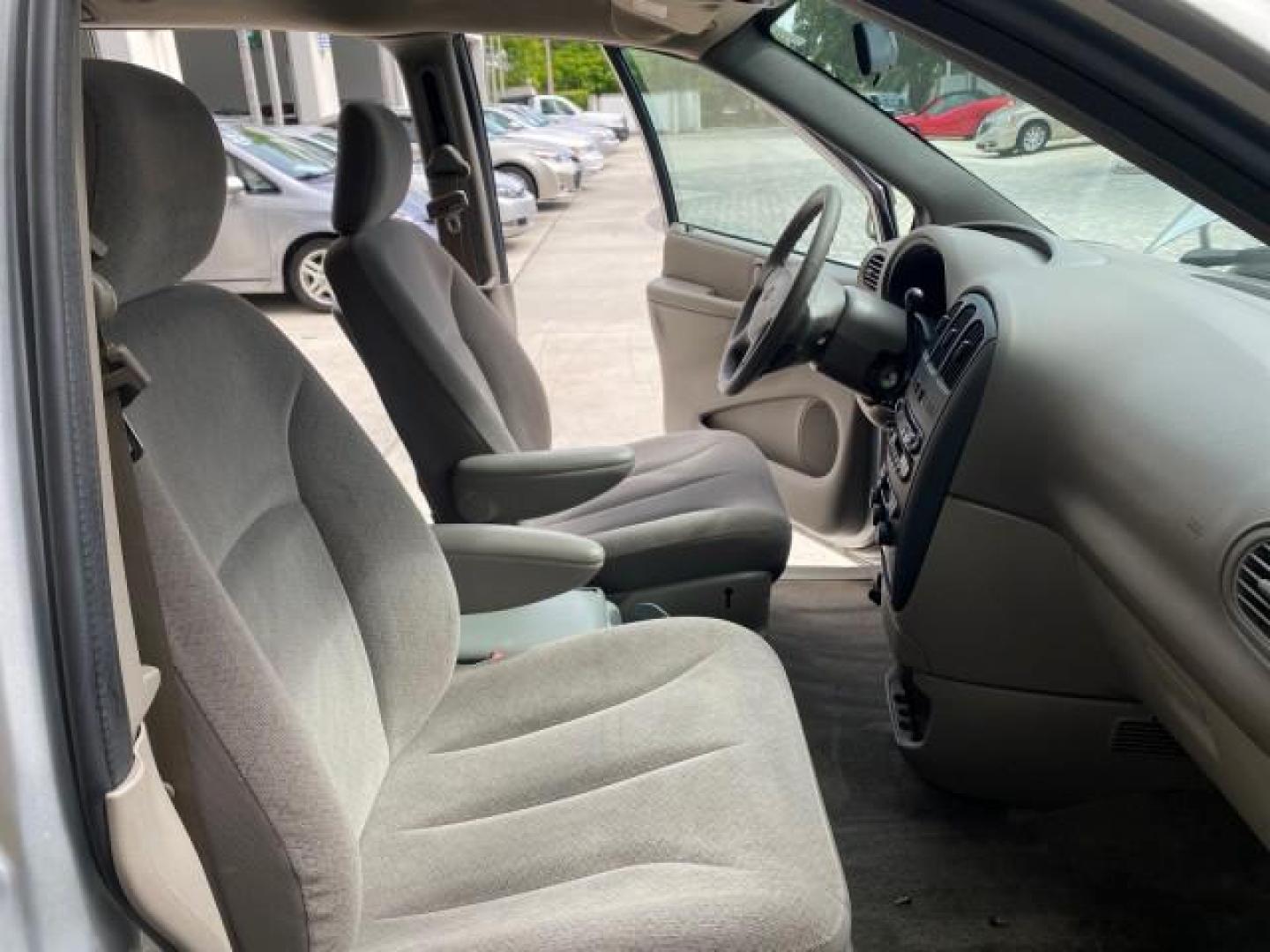 2003 Bright Silver Metallic /Taupe Dodge Caravan Sport LOW MILES 45,416 1 OWNER (2D4GP44L83R) with an 3.8L SMPI V6 Engine engine, Automatic transmission, located at 4701 North Dixie Hwy, Pompano Beach, FL, 33064, (954) 422-2889, 26.240938, -80.123474 - OUR WEBPAGE FLORIDACARS1.COM HAS OVER 100 PHOTOS AND FREE CARFAX LINK 2003 Dodge Grand Caravan Sport 1 OWNER Van 3.8L V6 F OHV 12V Gasoline 25 MPG Front Wheel Drive Features ABS Brakes Air Conditioning Alloy Wheels AM/FM Stereo Automatic Transmission Cassette Player CD Audio Cloth Seats Cruise Contr- Photo#12