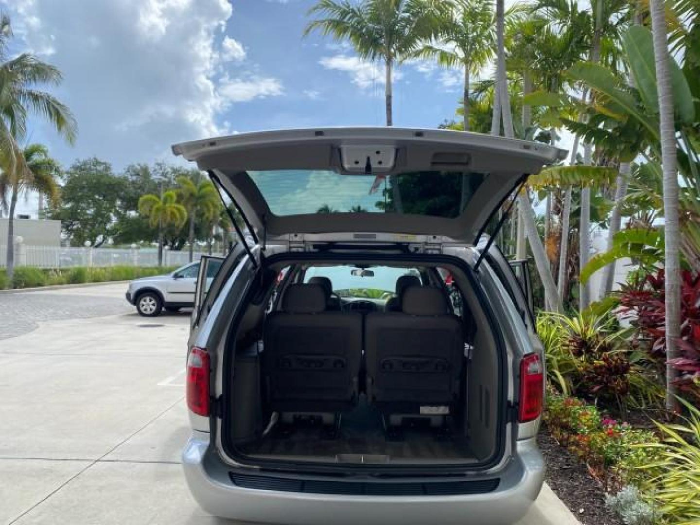 2003 Bright Silver Metallic /Taupe Dodge Caravan Sport LOW MILES 45,416 1 OWNER (2D4GP44L83R) with an 3.8L SMPI V6 Engine engine, Automatic transmission, located at 4701 North Dixie Hwy, Pompano Beach, FL, 33064, (954) 422-2889, 26.240938, -80.123474 - OUR WEBPAGE FLORIDACARS1.COM HAS OVER 100 PHOTOS AND FREE CARFAX LINK 2003 Dodge Grand Caravan Sport 1 OWNER Van 3.8L V6 F OHV 12V Gasoline 25 MPG Front Wheel Drive Features ABS Brakes Air Conditioning Alloy Wheels AM/FM Stereo Automatic Transmission Cassette Player CD Audio Cloth Seats Cruise Contr- Photo#15