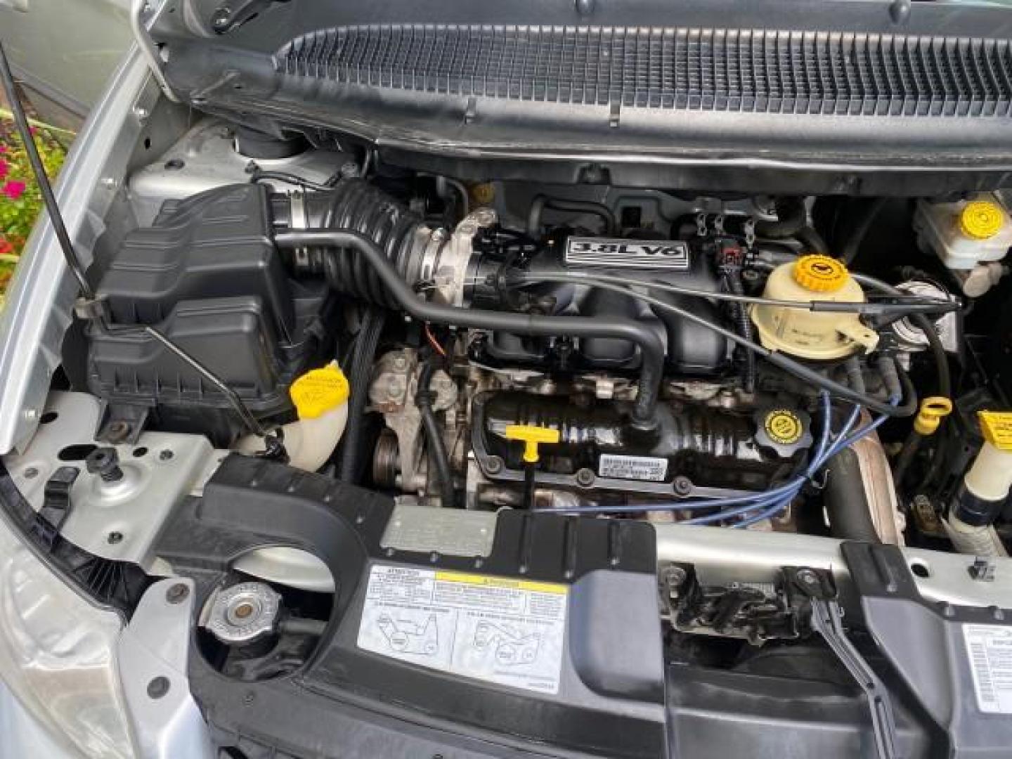 2003 Bright Silver Metallic /Taupe Dodge Caravan Sport LOW MILES 45,416 1 OWNER (2D4GP44L83R) with an 3.8L SMPI V6 Engine engine, Automatic transmission, located at 4701 North Dixie Hwy, Pompano Beach, FL, 33064, (954) 422-2889, 26.240938, -80.123474 - OUR WEBPAGE FLORIDACARS1.COM HAS OVER 100 PHOTOS AND FREE CARFAX LINK 2003 Dodge Grand Caravan Sport 1 OWNER Van 3.8L V6 F OHV 12V Gasoline 25 MPG Front Wheel Drive Features ABS Brakes Air Conditioning Alloy Wheels AM/FM Stereo Automatic Transmission Cassette Player CD Audio Cloth Seats Cruise Contr- Photo#24