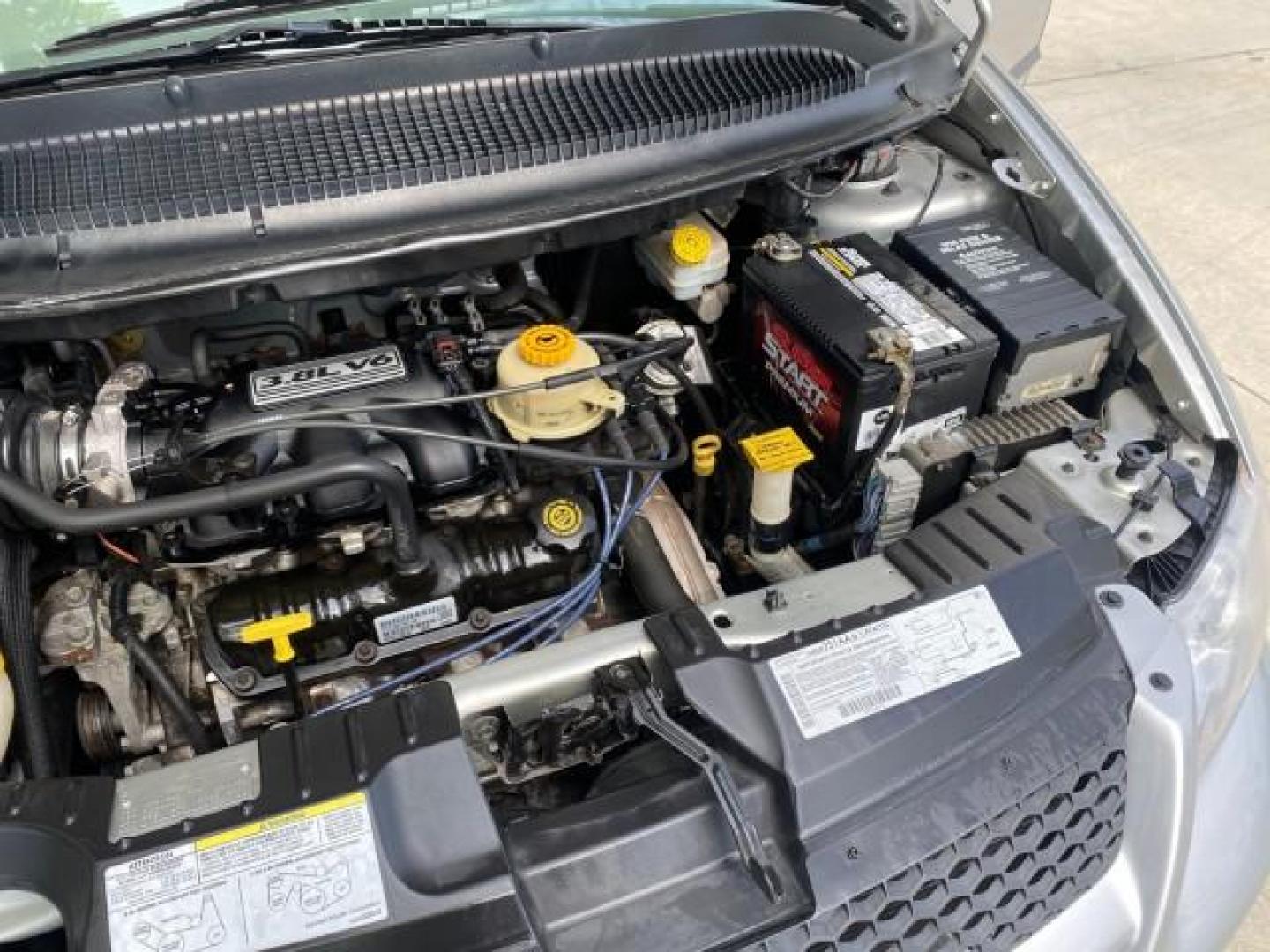 2003 Bright Silver Metallic /Taupe Dodge Caravan Sport LOW MILES 45,416 1 OWNER (2D4GP44L83R) with an 3.8L SMPI V6 Engine engine, Automatic transmission, located at 4701 North Dixie Hwy, Pompano Beach, FL, 33064, (954) 422-2889, 26.240938, -80.123474 - OUR WEBPAGE FLORIDACARS1.COM HAS OVER 100 PHOTOS AND FREE CARFAX LINK 2003 Dodge Grand Caravan Sport 1 OWNER Van 3.8L V6 F OHV 12V Gasoline 25 MPG Front Wheel Drive Features ABS Brakes Air Conditioning Alloy Wheels AM/FM Stereo Automatic Transmission Cassette Player CD Audio Cloth Seats Cruise Contr- Photo#25