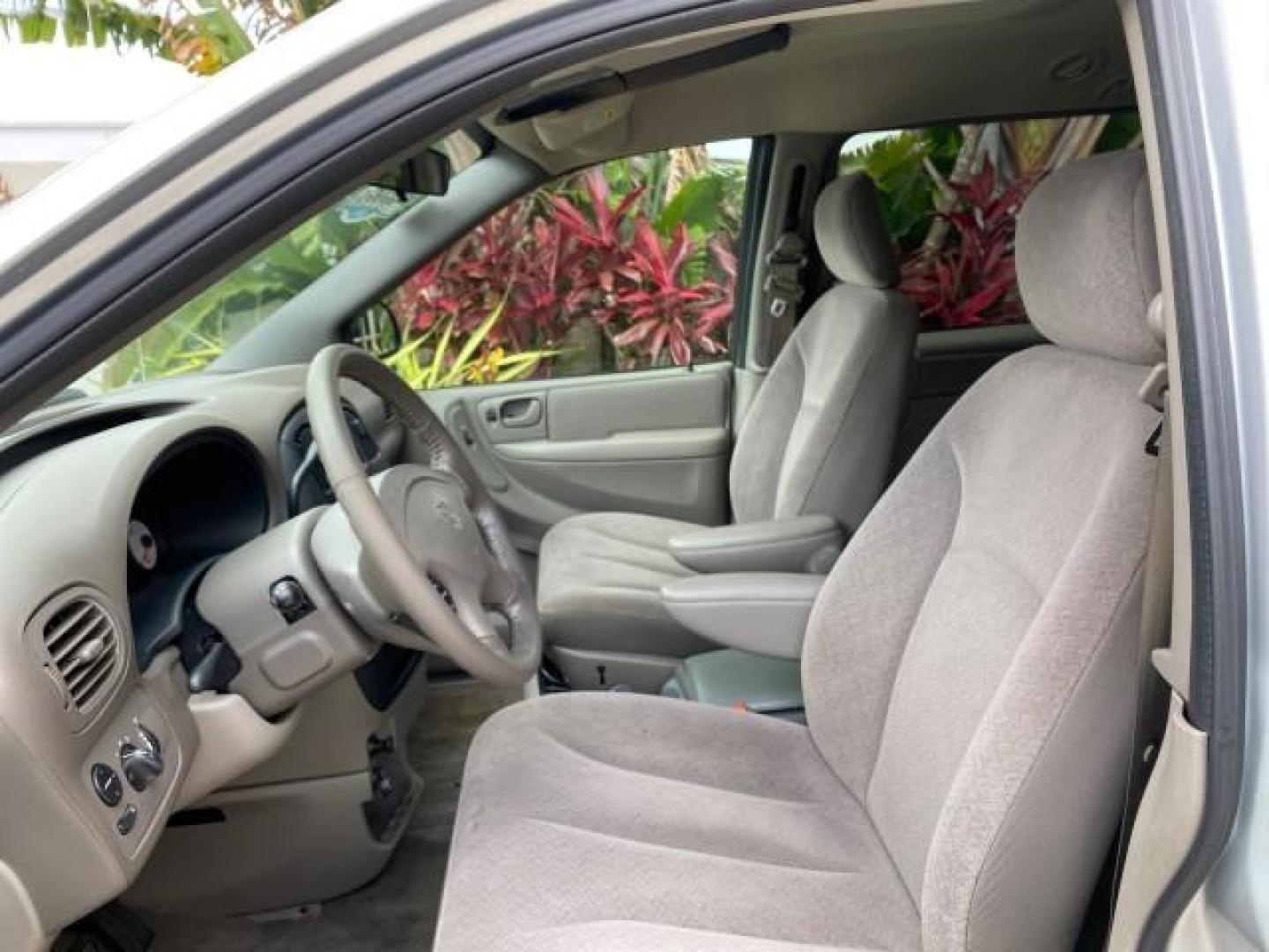 2003 Bright Silver Metallic /Taupe Dodge Caravan Sport LOW MILES 45,416 1 OWNER (2D4GP44L83R) with an 3.8L SMPI V6 Engine engine, Automatic transmission, located at 4701 North Dixie Hwy, Pompano Beach, FL, 33064, (954) 422-2889, 26.240938, -80.123474 - OUR WEBPAGE FLORIDACARS1.COM HAS OVER 100 PHOTOS AND FREE CARFAX LINK 2003 Dodge Grand Caravan Sport 1 OWNER Van 3.8L V6 F OHV 12V Gasoline 25 MPG Front Wheel Drive Features ABS Brakes Air Conditioning Alloy Wheels AM/FM Stereo Automatic Transmission Cassette Player CD Audio Cloth Seats Cruise Contr- Photo#42