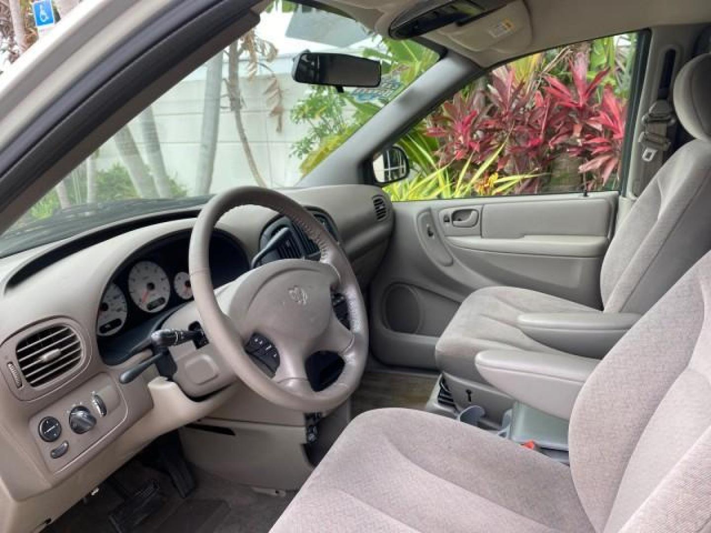 2003 Bright Silver Metallic /Taupe Dodge Caravan Sport LOW MILES 45,416 1 OWNER (2D4GP44L83R) with an 3.8L SMPI V6 Engine engine, Automatic transmission, located at 4701 North Dixie Hwy, Pompano Beach, FL, 33064, (954) 422-2889, 26.240938, -80.123474 - OUR WEBPAGE FLORIDACARS1.COM HAS OVER 100 PHOTOS AND FREE CARFAX LINK 2003 Dodge Grand Caravan Sport 1 OWNER Van 3.8L V6 F OHV 12V Gasoline 25 MPG Front Wheel Drive Features ABS Brakes Air Conditioning Alloy Wheels AM/FM Stereo Automatic Transmission Cassette Player CD Audio Cloth Seats Cruise Contr- Photo#44