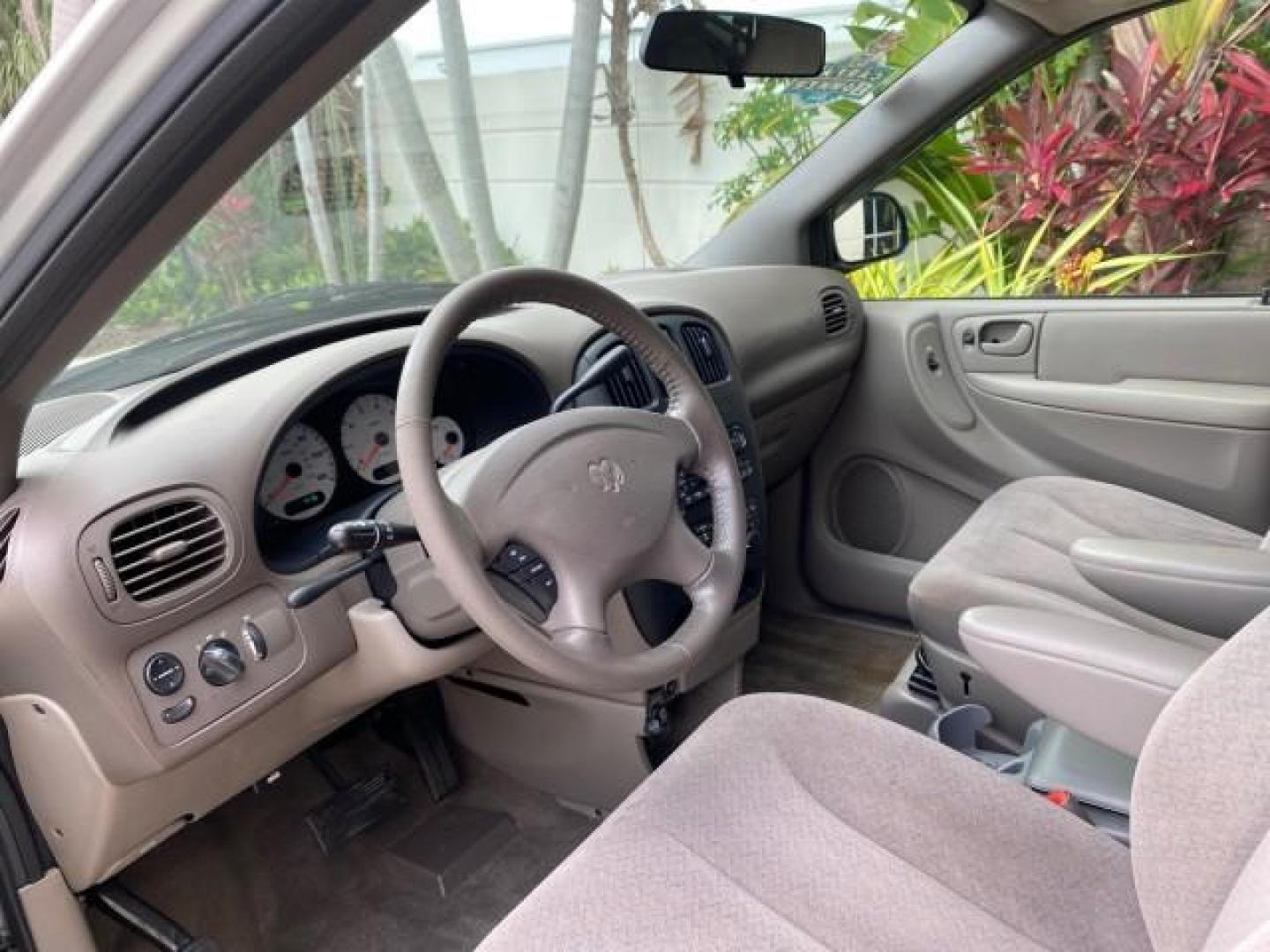 2003 Bright Silver Metallic /Taupe Dodge Caravan Sport LOW MILES 45,416 1 OWNER (2D4GP44L83R) with an 3.8L SMPI V6 Engine engine, Automatic transmission, located at 4701 North Dixie Hwy, Pompano Beach, FL, 33064, (954) 422-2889, 26.240938, -80.123474 - OUR WEBPAGE FLORIDACARS1.COM HAS OVER 100 PHOTOS AND FREE CARFAX LINK 2003 Dodge Grand Caravan Sport 1 OWNER Van 3.8L V6 F OHV 12V Gasoline 25 MPG Front Wheel Drive Features ABS Brakes Air Conditioning Alloy Wheels AM/FM Stereo Automatic Transmission Cassette Player CD Audio Cloth Seats Cruise Contr- Photo#45