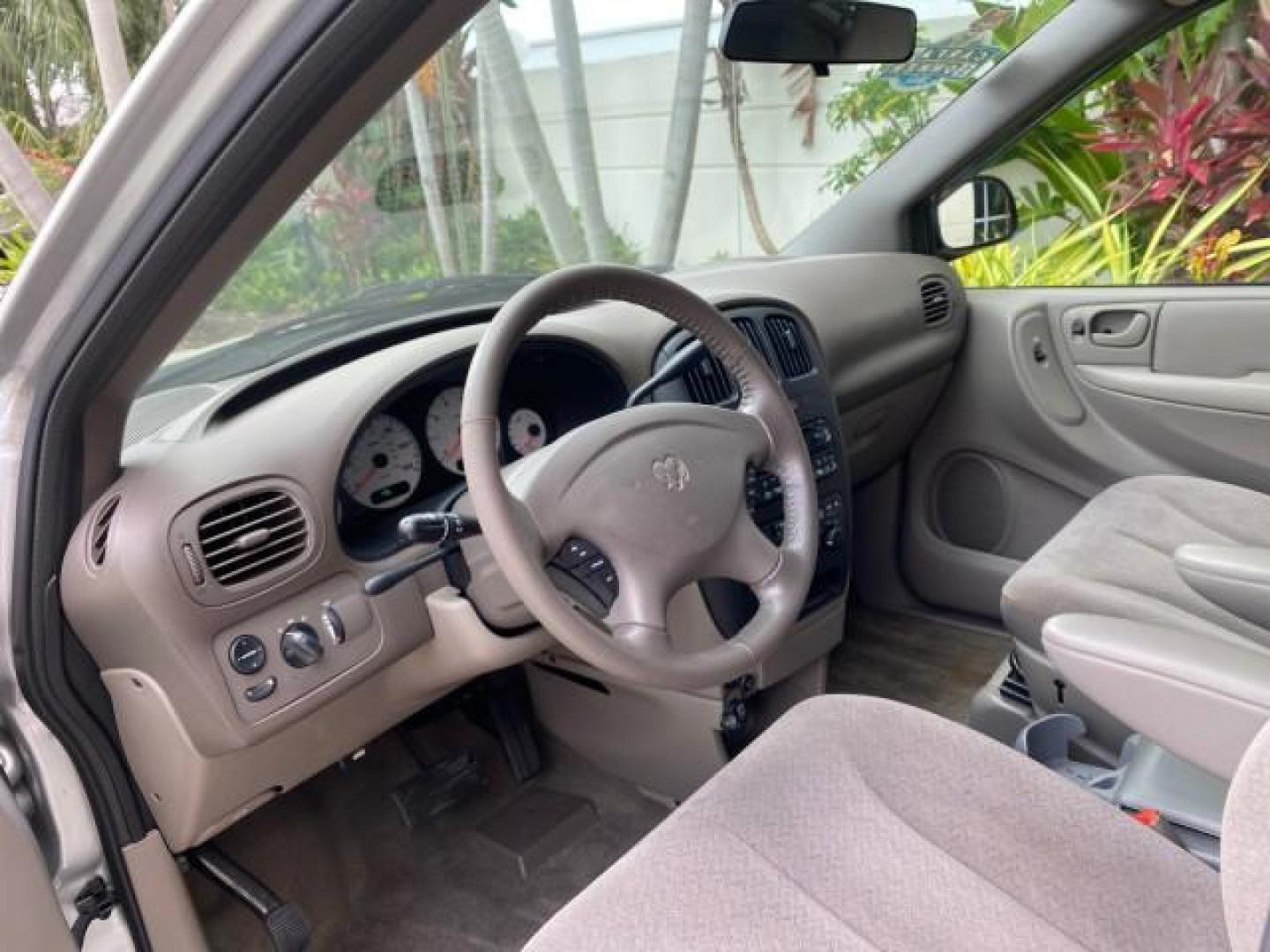 2003 Bright Silver Metallic /Taupe Dodge Caravan Sport LOW MILES 45,416 1 OWNER (2D4GP44L83R) with an 3.8L SMPI V6 Engine engine, Automatic transmission, located at 4701 North Dixie Hwy, Pompano Beach, FL, 33064, (954) 422-2889, 26.240938, -80.123474 - OUR WEBPAGE FLORIDACARS1.COM HAS OVER 100 PHOTOS AND FREE CARFAX LINK 2003 Dodge Grand Caravan Sport 1 OWNER Van 3.8L V6 F OHV 12V Gasoline 25 MPG Front Wheel Drive Features ABS Brakes Air Conditioning Alloy Wheels AM/FM Stereo Automatic Transmission Cassette Player CD Audio Cloth Seats Cruise Contr- Photo#46