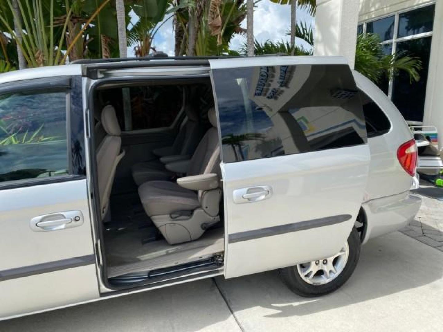 2003 Bright Silver Metallic /Taupe Dodge Caravan Sport LOW MILES 45,416 1 OWNER (2D4GP44L83R) with an 3.8L SMPI V6 Engine engine, Automatic transmission, located at 4701 North Dixie Hwy, Pompano Beach, FL, 33064, (954) 422-2889, 26.240938, -80.123474 - OUR WEBPAGE FLORIDACARS1.COM HAS OVER 100 PHOTOS AND FREE CARFAX LINK 2003 Dodge Grand Caravan Sport 1 OWNER Van 3.8L V6 F OHV 12V Gasoline 25 MPG Front Wheel Drive Features ABS Brakes Air Conditioning Alloy Wheels AM/FM Stereo Automatic Transmission Cassette Player CD Audio Cloth Seats Cruise Contr- Photo#69