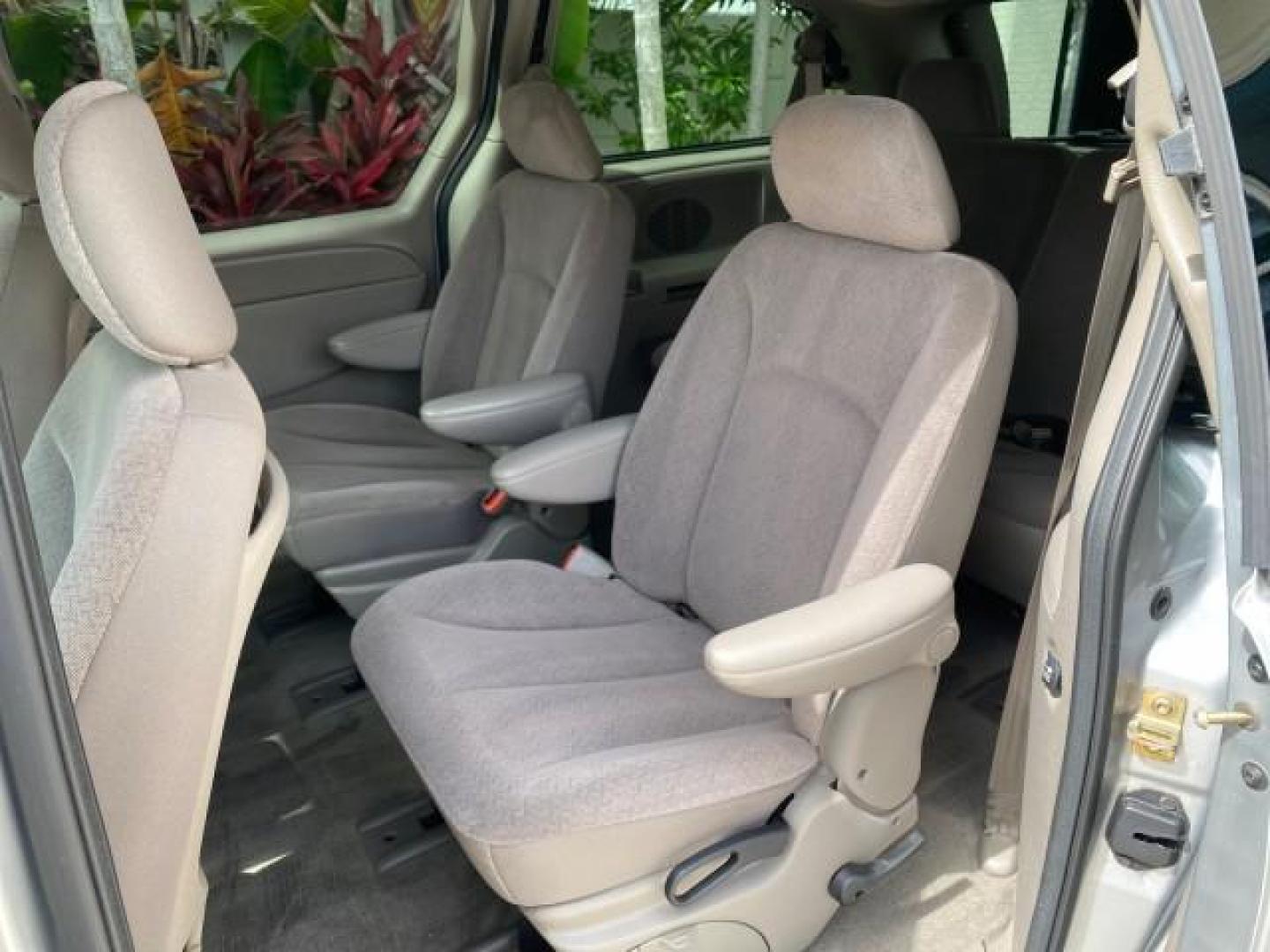 2003 Bright Silver Metallic /Taupe Dodge Caravan Sport LOW MILES 45,416 1 OWNER (2D4GP44L83R) with an 3.8L SMPI V6 Engine engine, Automatic transmission, located at 4701 North Dixie Hwy, Pompano Beach, FL, 33064, (954) 422-2889, 26.240938, -80.123474 - OUR WEBPAGE FLORIDACARS1.COM HAS OVER 100 PHOTOS AND FREE CARFAX LINK 2003 Dodge Grand Caravan Sport 1 OWNER Van 3.8L V6 F OHV 12V Gasoline 25 MPG Front Wheel Drive Features ABS Brakes Air Conditioning Alloy Wheels AM/FM Stereo Automatic Transmission Cassette Player CD Audio Cloth Seats Cruise Contr- Photo#71