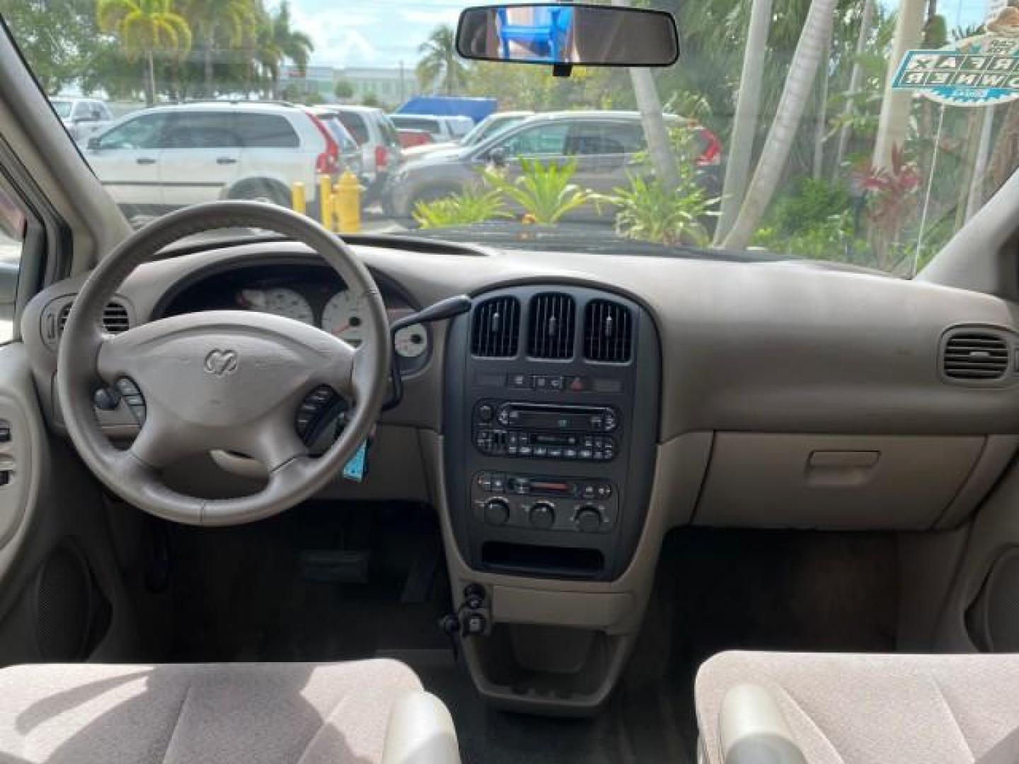 2003 Bright Silver Metallic /Taupe Dodge Caravan Sport LOW MILES 45,416 1 OWNER (2D4GP44L83R) with an 3.8L SMPI V6 Engine engine, Automatic transmission, located at 4701 North Dixie Hwy, Pompano Beach, FL, 33064, (954) 422-2889, 26.240938, -80.123474 - OUR WEBPAGE FLORIDACARS1.COM HAS OVER 100 PHOTOS AND FREE CARFAX LINK 2003 Dodge Grand Caravan Sport 1 OWNER Van 3.8L V6 F OHV 12V Gasoline 25 MPG Front Wheel Drive Features ABS Brakes Air Conditioning Alloy Wheels AM/FM Stereo Automatic Transmission Cassette Player CD Audio Cloth Seats Cruise Contr- Photo#74