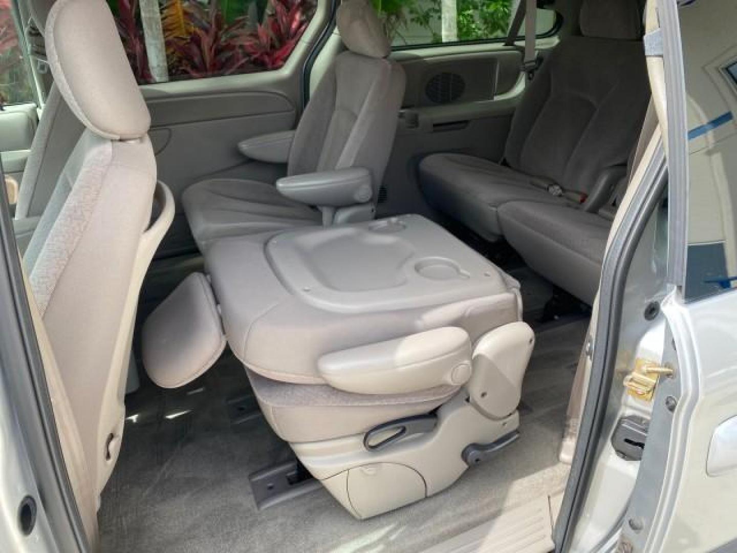2003 Bright Silver Metallic /Taupe Dodge Caravan Sport LOW MILES 45,416 1 OWNER (2D4GP44L83R) with an 3.8L SMPI V6 Engine engine, Automatic transmission, located at 4701 North Dixie Hwy, Pompano Beach, FL, 33064, (954) 422-2889, 26.240938, -80.123474 - OUR WEBPAGE FLORIDACARS1.COM HAS OVER 100 PHOTOS AND FREE CARFAX LINK 2003 Dodge Grand Caravan Sport 1 OWNER Van 3.8L V6 F OHV 12V Gasoline 25 MPG Front Wheel Drive Features ABS Brakes Air Conditioning Alloy Wheels AM/FM Stereo Automatic Transmission Cassette Player CD Audio Cloth Seats Cruise Contr- Photo#77