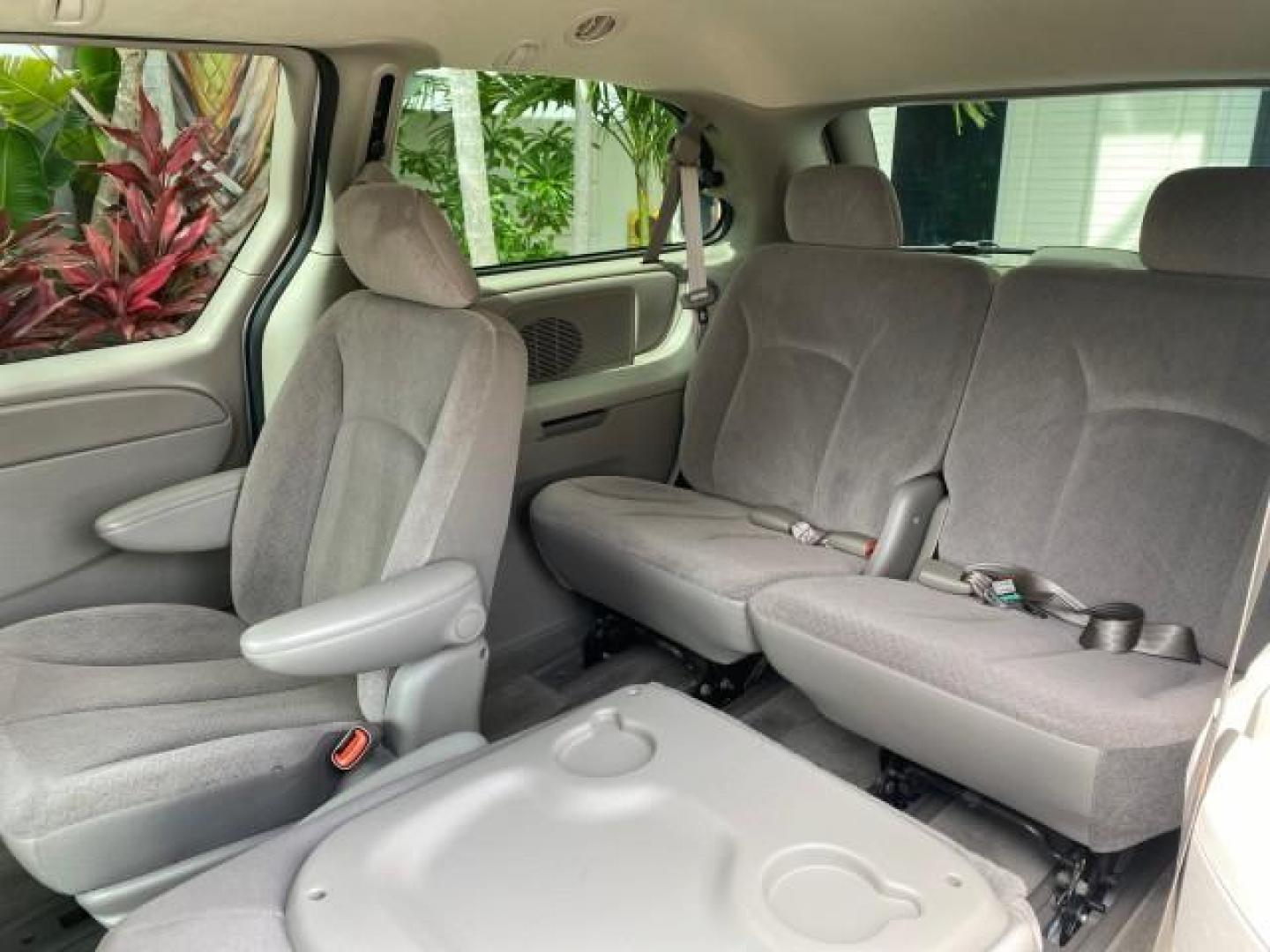 2003 Bright Silver Metallic /Taupe Dodge Caravan Sport LOW MILES 45,416 1 OWNER (2D4GP44L83R) with an 3.8L SMPI V6 Engine engine, Automatic transmission, located at 4701 North Dixie Hwy, Pompano Beach, FL, 33064, (954) 422-2889, 26.240938, -80.123474 - OUR WEBPAGE FLORIDACARS1.COM HAS OVER 100 PHOTOS AND FREE CARFAX LINK 2003 Dodge Grand Caravan Sport 1 OWNER Van 3.8L V6 F OHV 12V Gasoline 25 MPG Front Wheel Drive Features ABS Brakes Air Conditioning Alloy Wheels AM/FM Stereo Automatic Transmission Cassette Player CD Audio Cloth Seats Cruise Contr- Photo#79