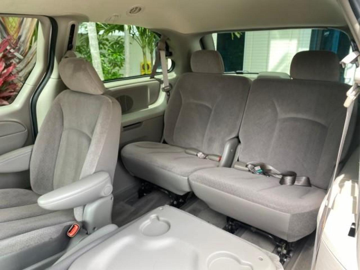 2003 Bright Silver Metallic /Taupe Dodge Caravan Sport LOW MILES 45,416 1 OWNER (2D4GP44L83R) with an 3.8L SMPI V6 Engine engine, Automatic transmission, located at 4701 North Dixie Hwy, Pompano Beach, FL, 33064, (954) 422-2889, 26.240938, -80.123474 - OUR WEBPAGE FLORIDACARS1.COM HAS OVER 100 PHOTOS AND FREE CARFAX LINK 2003 Dodge Grand Caravan Sport 1 OWNER Van 3.8L V6 F OHV 12V Gasoline 25 MPG Front Wheel Drive Features ABS Brakes Air Conditioning Alloy Wheels AM/FM Stereo Automatic Transmission Cassette Player CD Audio Cloth Seats Cruise Contr- Photo#80
