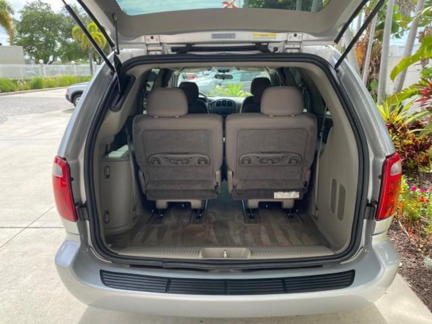 2003 Bright Silver Metallic /Taupe Dodge Caravan Sport LOW MILES 45,416 1 OWNER (2D4GP44L83R) with an 3.8L SMPI V6 Engine engine, Automatic transmission, located at 4701 North Dixie Hwy, Pompano Beach, FL, 33064, (954) 422-2889, 26.240938, -80.123474 - OUR WEBPAGE FLORIDACARS1.COM HAS OVER 100 PHOTOS AND FREE CARFAX LINK 2003 Dodge Grand Caravan Sport 1 OWNER Van 3.8L V6 F OHV 12V Gasoline 25 MPG Front Wheel Drive Features ABS Brakes Air Conditioning Alloy Wheels AM/FM Stereo Automatic Transmission Cassette Player CD Audio Cloth Seats Cruise Contr- Photo#93