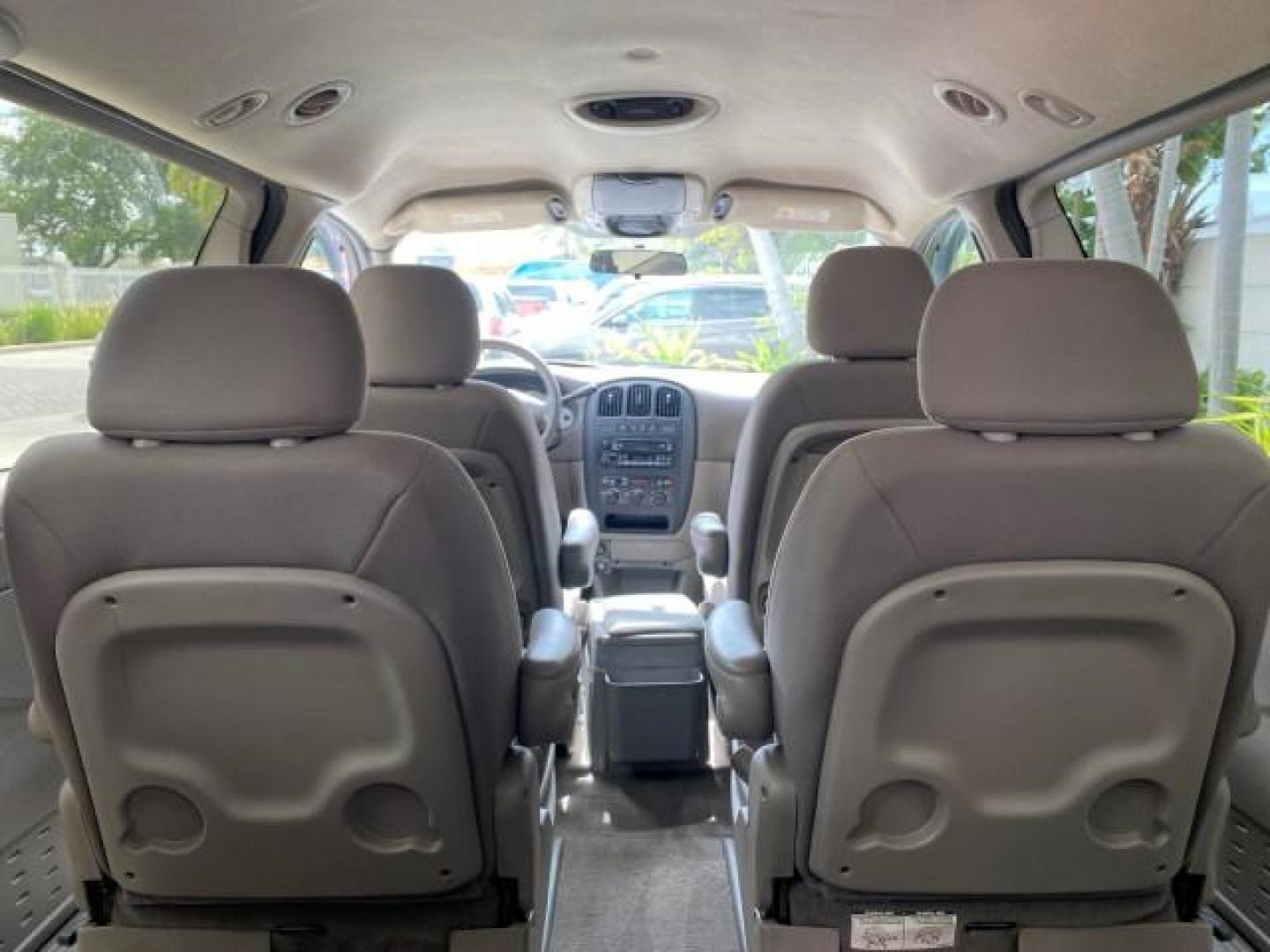 2003 Bright Silver Metallic /Taupe Dodge Caravan Sport LOW MILES 45,416 1 OWNER (2D4GP44L83R) with an 3.8L SMPI V6 Engine engine, Automatic transmission, located at 4701 North Dixie Hwy, Pompano Beach, FL, 33064, (954) 422-2889, 26.240938, -80.123474 - OUR WEBPAGE FLORIDACARS1.COM HAS OVER 100 PHOTOS AND FREE CARFAX LINK 2003 Dodge Grand Caravan Sport 1 OWNER Van 3.8L V6 F OHV 12V Gasoline 25 MPG Front Wheel Drive Features ABS Brakes Air Conditioning Alloy Wheels AM/FM Stereo Automatic Transmission Cassette Player CD Audio Cloth Seats Cruise Contr- Photo#97