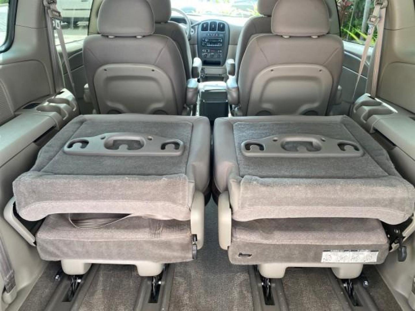 2003 Bright Silver Metallic /Taupe Dodge Caravan Sport LOW MILES 45,416 1 OWNER (2D4GP44L83R) with an 3.8L SMPI V6 Engine engine, Automatic transmission, located at 4701 North Dixie Hwy, Pompano Beach, FL, 33064, (954) 422-2889, 26.240938, -80.123474 - OUR WEBPAGE FLORIDACARS1.COM HAS OVER 100 PHOTOS AND FREE CARFAX LINK 2003 Dodge Grand Caravan Sport 1 OWNER Van 3.8L V6 F OHV 12V Gasoline 25 MPG Front Wheel Drive Features ABS Brakes Air Conditioning Alloy Wheels AM/FM Stereo Automatic Transmission Cassette Player CD Audio Cloth Seats Cruise Contr- Photo#99