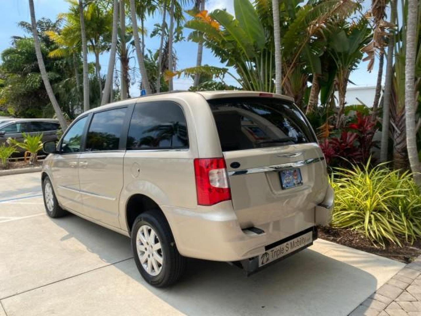 2016 Cashmere/Sandstone Pearlcoat /Dk Frost Beige/Med Beige Chrysler Town and Country REAR DOOR, HANDICAP RAMP LOW MILES 58,632 (2C4RC1BG4GR) with an 3.6L V6 Cylinder Engine engine, Automatic transmission, located at 4701 North Dixie Hwy, Pompano Beach, FL, 33064, (954) 422-2889, 26.240938, -80.123474 - OUR WEBPAGE FLORIDACARS1.COM HAS OVER 100 PHOTOS AND FREE CARFAX LINK 2016 Chrysler Town AND Country Touring Van 3.6L V6 F DOHC 24V Gasoline 25 MPG Front Wheel Drive Features ABS Brakes Air Conditioning Alloy Wheels AM/FM Stereo Automatic Transmission Auxiliary Audio Input Bluetooth Technology CD Au- Photo#5