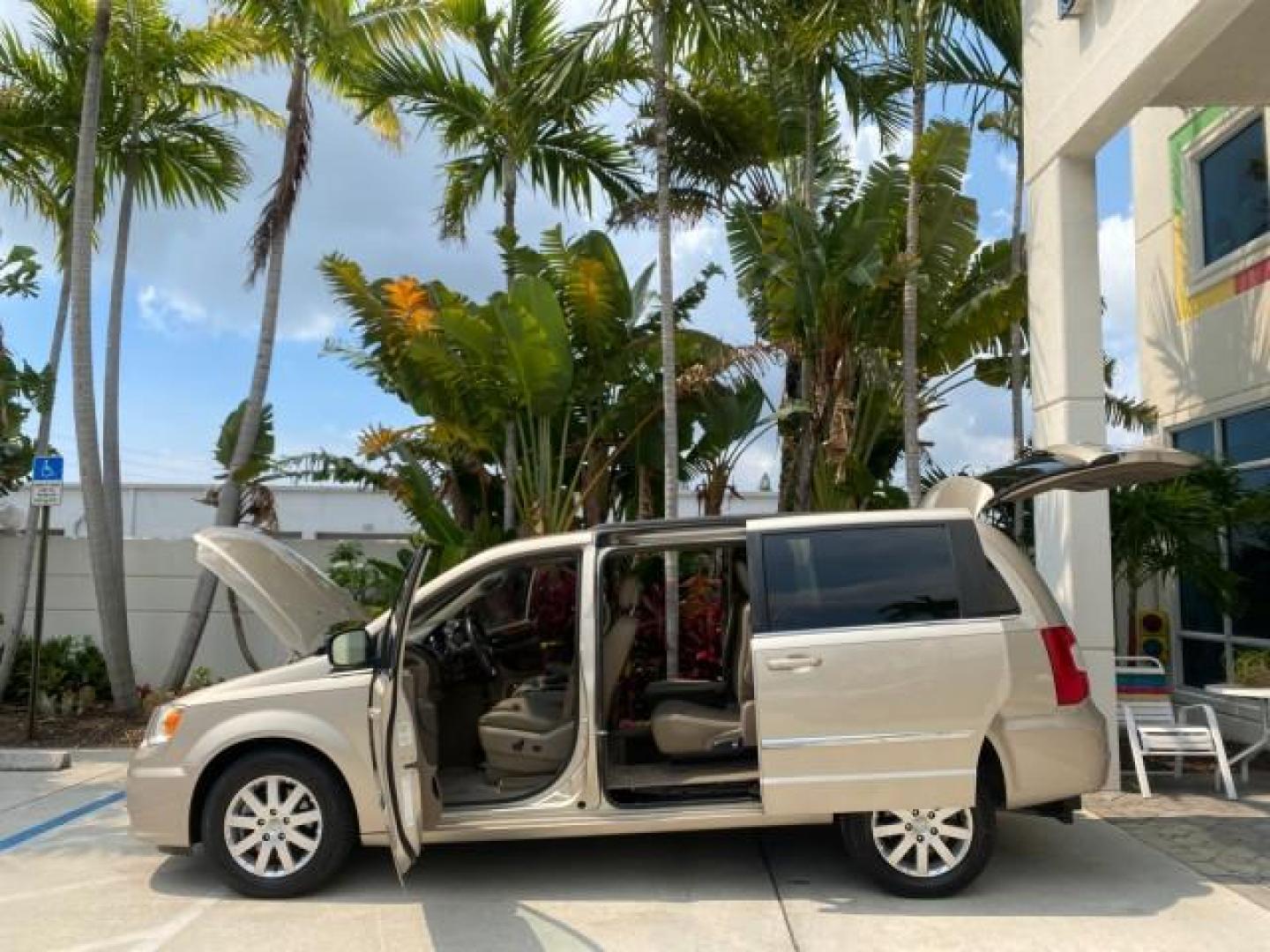 2016 Cashmere/Sandstone Pearlcoat /Dk Frost Beige/Med Beige Chrysler Town and Country REAR DOOR, HANDICAP RAMP LOW MILES 58,632 (2C4RC1BG4GR) with an 3.6L V6 Cylinder Engine engine, Automatic transmission, located at 4701 North Dixie Hwy, Pompano Beach, FL, 33064, (954) 422-2889, 26.240938, -80.123474 - OUR WEBPAGE FLORIDACARS1.COM HAS OVER 100 PHOTOS AND FREE CARFAX LINK 2016 Chrysler Town AND Country Touring Van 3.6L V6 F DOHC 24V Gasoline 25 MPG Front Wheel Drive Features ABS Brakes Air Conditioning Alloy Wheels AM/FM Stereo Automatic Transmission Auxiliary Audio Input Bluetooth Technology CD Au- Photo#8