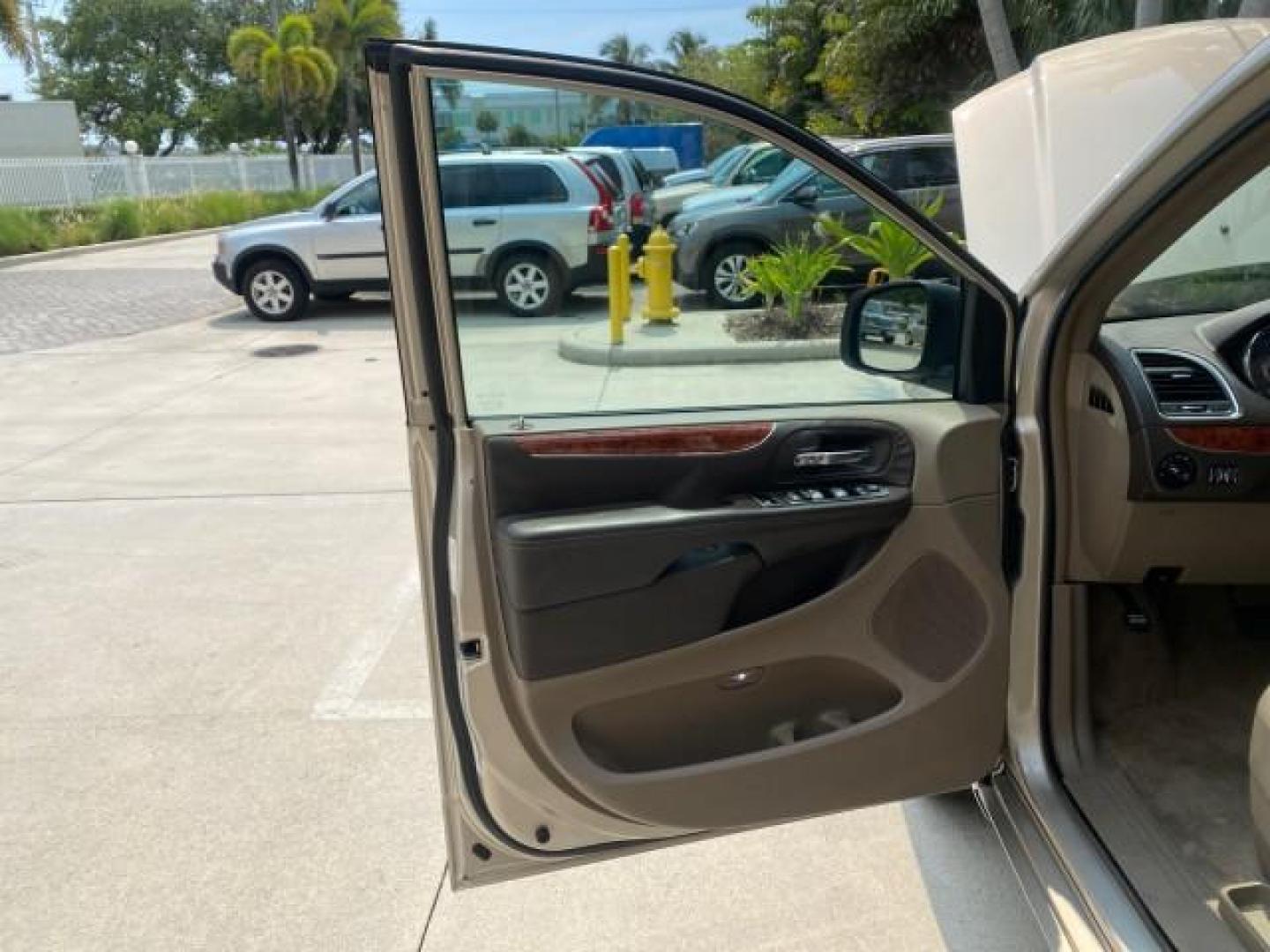 2016 Cashmere/Sandstone Pearlcoat /Dk Frost Beige/Med Beige Chrysler Town and Country REAR DOOR, HANDICAP RAMP LOW MILES 58,632 (2C4RC1BG4GR) with an 3.6L V6 Cylinder Engine engine, Automatic transmission, located at 4701 North Dixie Hwy, Pompano Beach, FL, 33064, (954) 422-2889, 26.240938, -80.123474 - OUR WEBPAGE FLORIDACARS1.COM HAS OVER 100 PHOTOS AND FREE CARFAX LINK 2016 Chrysler Town AND Country Touring Van 3.6L V6 F DOHC 24V Gasoline 25 MPG Front Wheel Drive Features ABS Brakes Air Conditioning Alloy Wheels AM/FM Stereo Automatic Transmission Auxiliary Audio Input Bluetooth Technology CD Au- Photo#9