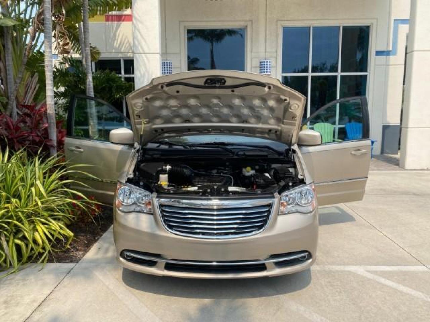 2016 Cashmere/Sandstone Pearlcoat /Dk Frost Beige/Med Beige Chrysler Town and Country REAR DOOR, HANDICAP RAMP LOW MILES 58,632 (2C4RC1BG4GR) with an 3.6L V6 Cylinder Engine engine, Automatic transmission, located at 4701 North Dixie Hwy, Pompano Beach, FL, 33064, (954) 422-2889, 26.240938, -80.123474 - OUR WEBPAGE FLORIDACARS1.COM HAS OVER 100 PHOTOS AND FREE CARFAX LINK 2016 Chrysler Town AND Country Touring Van 3.6L V6 F DOHC 24V Gasoline 25 MPG Front Wheel Drive Features ABS Brakes Air Conditioning Alloy Wheels AM/FM Stereo Automatic Transmission Auxiliary Audio Input Bluetooth Technology CD Au- Photo#16