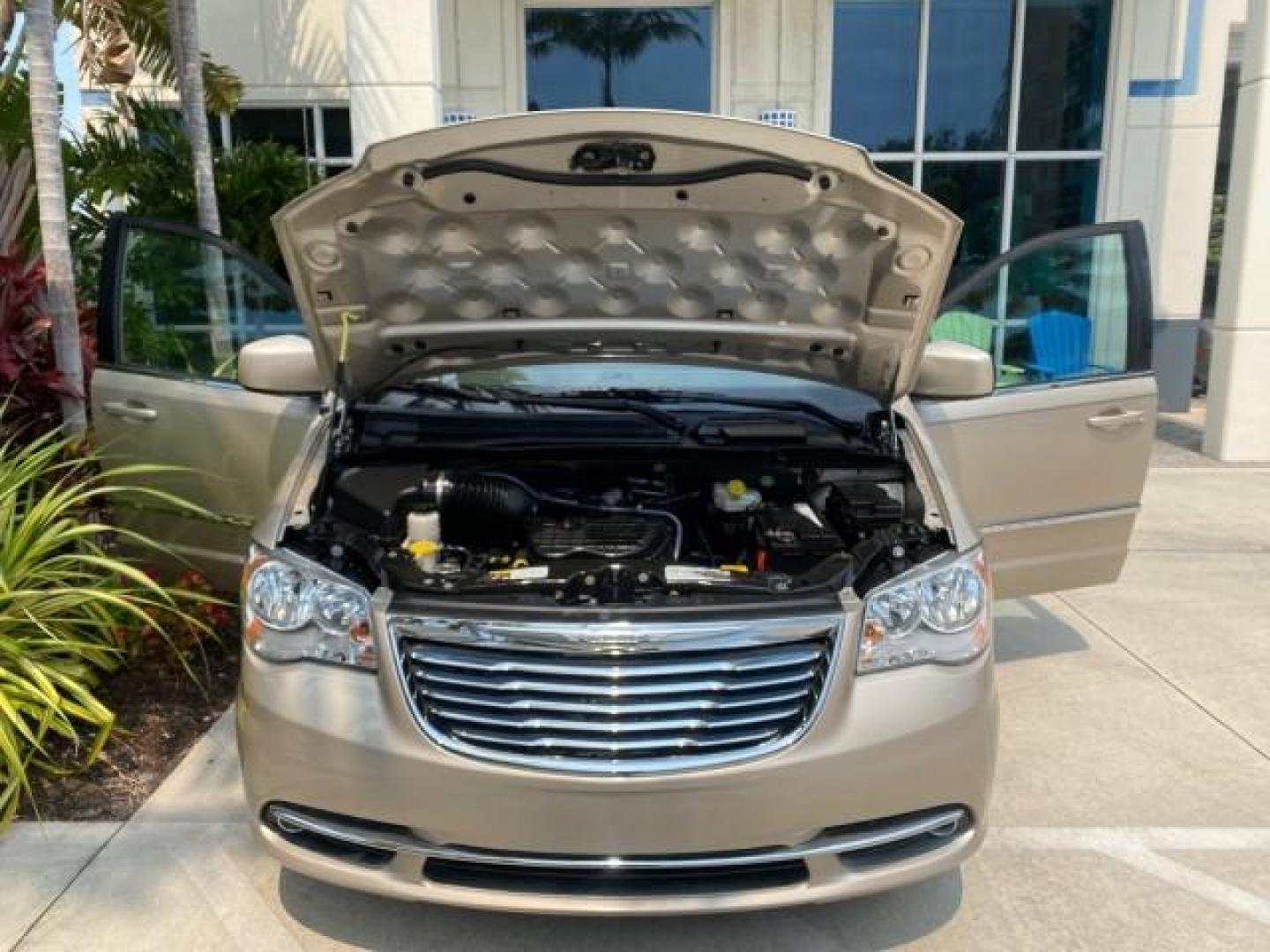 2016 Cashmere/Sandstone Pearlcoat /Dk Frost Beige/Med Beige Chrysler Town and Country REAR DOOR, HANDICAP RAMP LOW MILES 58,632 (2C4RC1BG4GR) with an 3.6L V6 Cylinder Engine engine, Automatic transmission, located at 4701 North Dixie Hwy, Pompano Beach, FL, 33064, (954) 422-2889, 26.240938, -80.123474 - OUR WEBPAGE FLORIDACARS1.COM HAS OVER 100 PHOTOS AND FREE CARFAX LINK 2016 Chrysler Town AND Country Touring Van 3.6L V6 F DOHC 24V Gasoline 25 MPG Front Wheel Drive Features ABS Brakes Air Conditioning Alloy Wheels AM/FM Stereo Automatic Transmission Auxiliary Audio Input Bluetooth Technology CD Au- Photo#17