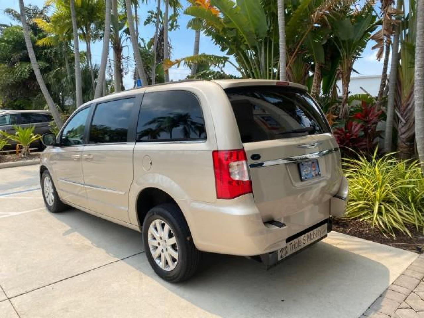 2016 Cashmere/Sandstone Pearlcoat /Dk Frost Beige/Med Beige Chrysler Town and Country REAR DOOR, HANDICAP RAMP LOW MILES 58,632 (2C4RC1BG4GR) with an 3.6L V6 Cylinder Engine engine, Automatic transmission, located at 4701 North Dixie Hwy, Pompano Beach, FL, 33064, (954) 422-2889, 26.240938, -80.123474 - OUR WEBPAGE FLORIDACARS1.COM HAS OVER 100 PHOTOS AND FREE CARFAX LINK 2016 Chrysler Town AND Country Touring Van 3.6L V6 F DOHC 24V Gasoline 25 MPG Front Wheel Drive Features ABS Brakes Air Conditioning Alloy Wheels AM/FM Stereo Automatic Transmission Auxiliary Audio Input Bluetooth Technology CD Au- Photo#31