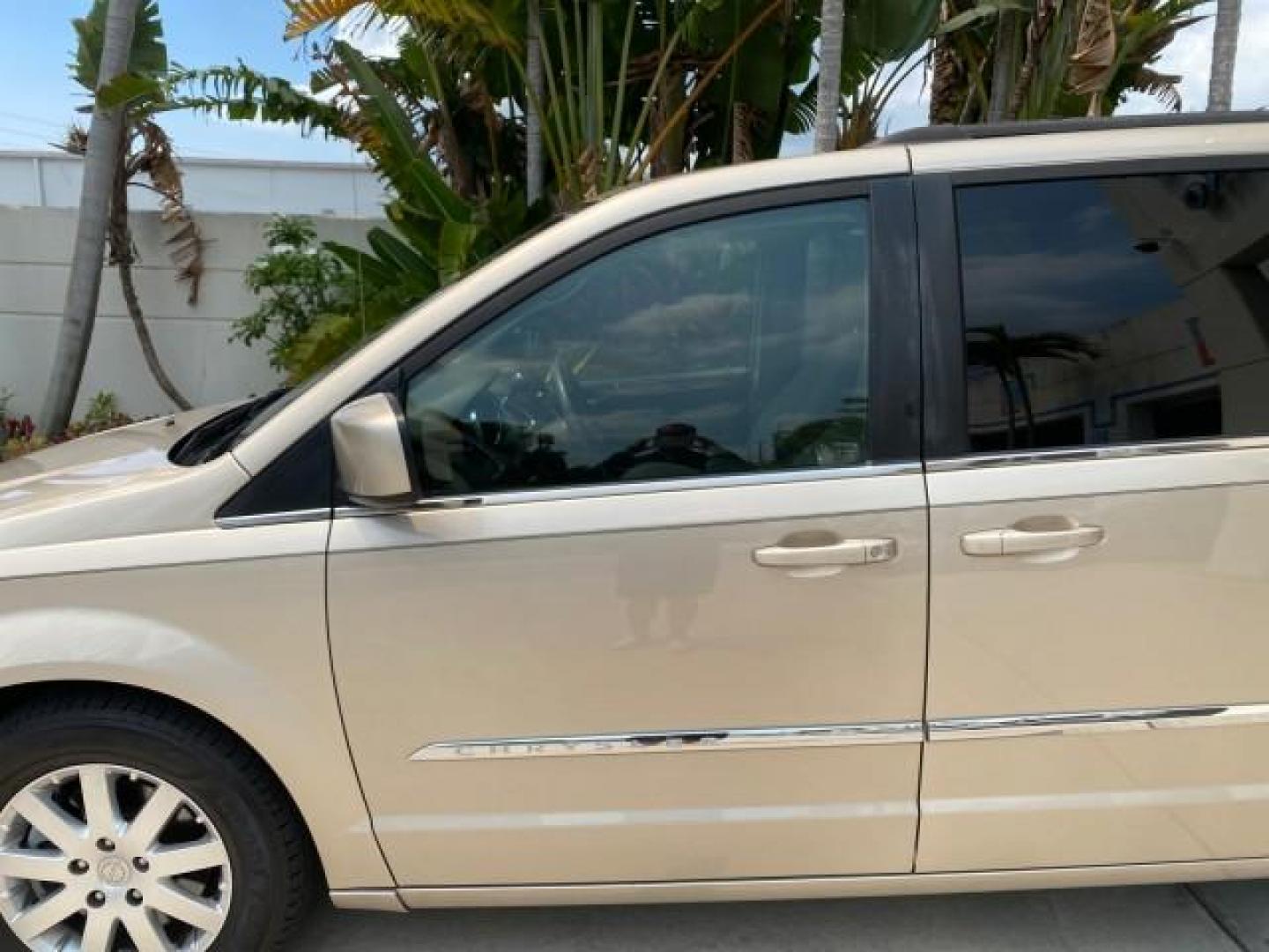 2016 Cashmere/Sandstone Pearlcoat /Dk Frost Beige/Med Beige Chrysler Town and Country REAR DOOR, HANDICAP RAMP LOW MILES 58,632 (2C4RC1BG4GR) with an 3.6L V6 Cylinder Engine engine, Automatic transmission, located at 4701 North Dixie Hwy, Pompano Beach, FL, 33064, (954) 422-2889, 26.240938, -80.123474 - OUR WEBPAGE FLORIDACARS1.COM HAS OVER 100 PHOTOS AND FREE CARFAX LINK 2016 Chrysler Town AND Country Touring Van 3.6L V6 F DOHC 24V Gasoline 25 MPG Front Wheel Drive Features ABS Brakes Air Conditioning Alloy Wheels AM/FM Stereo Automatic Transmission Auxiliary Audio Input Bluetooth Technology CD Au- Photo#35