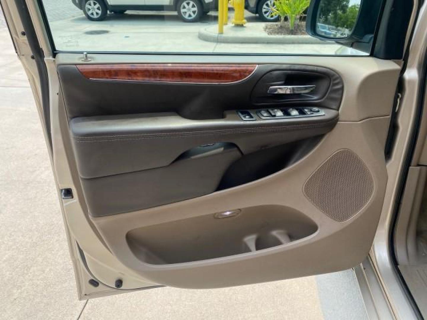 2016 Cashmere/Sandstone Pearlcoat /Dk Frost Beige/Med Beige Chrysler Town and Country REAR DOOR, HANDICAP RAMP LOW MILES 58,632 (2C4RC1BG4GR) with an 3.6L V6 Cylinder Engine engine, Automatic transmission, located at 4701 North Dixie Hwy, Pompano Beach, FL, 33064, (954) 422-2889, 26.240938, -80.123474 - OUR WEBPAGE FLORIDACARS1.COM HAS OVER 100 PHOTOS AND FREE CARFAX LINK 2016 Chrysler Town AND Country Touring Van 3.6L V6 F DOHC 24V Gasoline 25 MPG Front Wheel Drive Features ABS Brakes Air Conditioning Alloy Wheels AM/FM Stereo Automatic Transmission Auxiliary Audio Input Bluetooth Technology CD Au- Photo#40