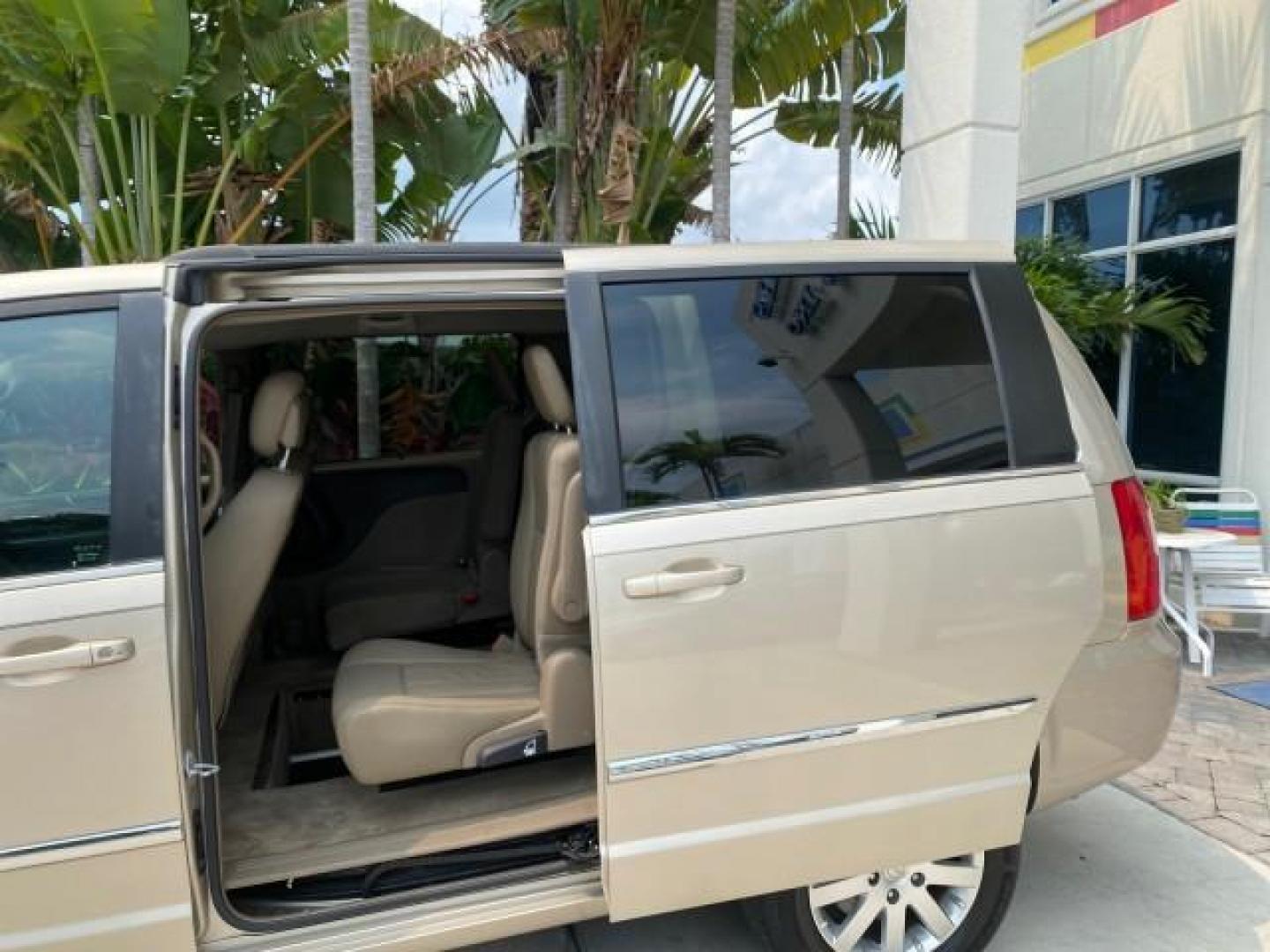 2016 Cashmere/Sandstone Pearlcoat /Dk Frost Beige/Med Beige Chrysler Town and Country REAR DOOR, HANDICAP RAMP LOW MILES 58,632 (2C4RC1BG4GR) with an 3.6L V6 Cylinder Engine engine, Automatic transmission, located at 4701 North Dixie Hwy, Pompano Beach, FL, 33064, (954) 422-2889, 26.240938, -80.123474 - OUR WEBPAGE FLORIDACARS1.COM HAS OVER 100 PHOTOS AND FREE CARFAX LINK 2016 Chrysler Town AND Country Touring Van 3.6L V6 F DOHC 24V Gasoline 25 MPG Front Wheel Drive Features ABS Brakes Air Conditioning Alloy Wheels AM/FM Stereo Automatic Transmission Auxiliary Audio Input Bluetooth Technology CD Au- Photo#62