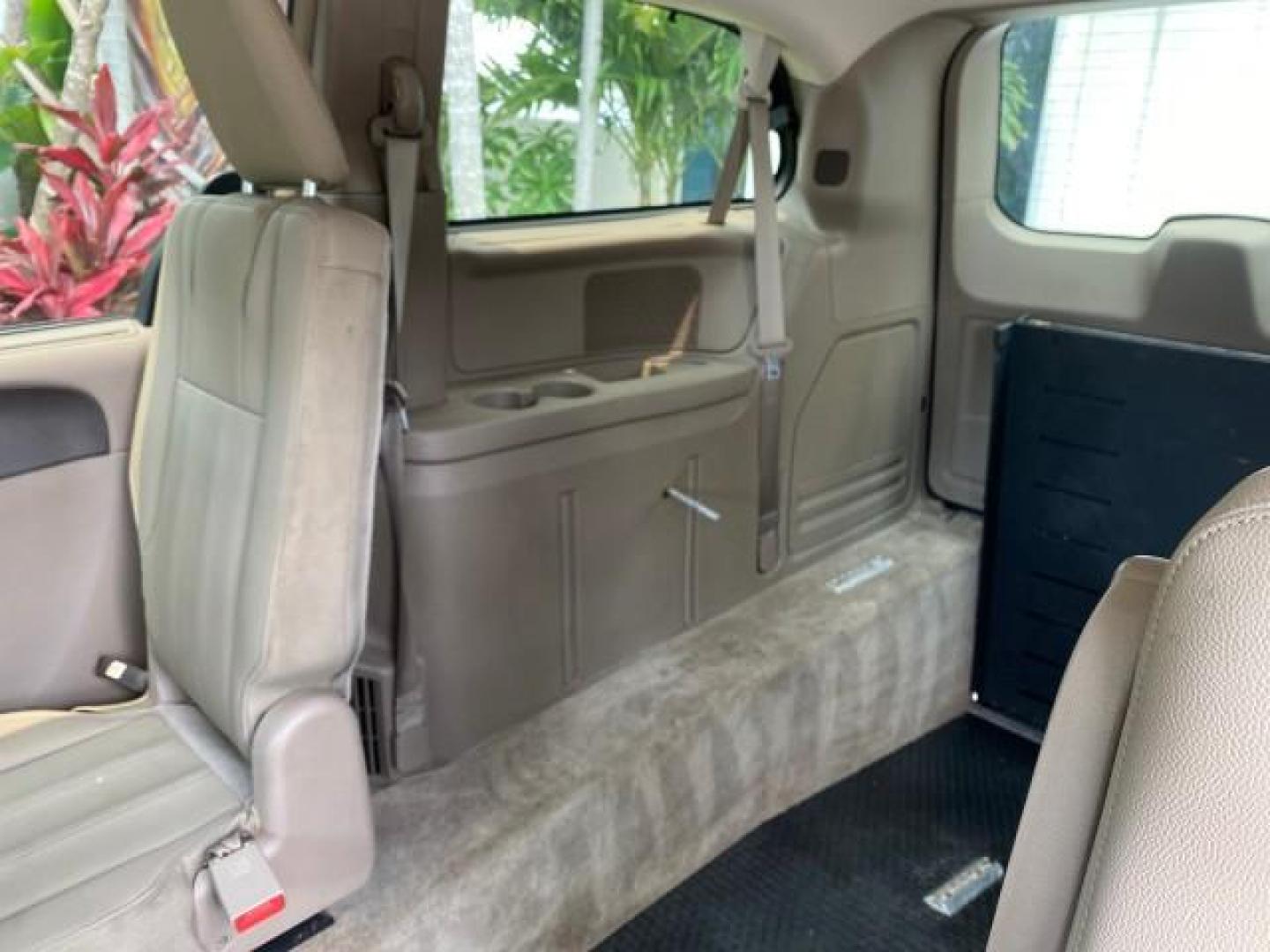 2016 Cashmere/Sandstone Pearlcoat /Dk Frost Beige/Med Beige Chrysler Town and Country REAR DOOR, HANDICAP RAMP LOW MILES 58,632 (2C4RC1BG4GR) with an 3.6L V6 Cylinder Engine engine, Automatic transmission, located at 4701 North Dixie Hwy, Pompano Beach, FL, 33064, (954) 422-2889, 26.240938, -80.123474 - OUR WEBPAGE FLORIDACARS1.COM HAS OVER 100 PHOTOS AND FREE CARFAX LINK 2016 Chrysler Town AND Country Touring Van 3.6L V6 F DOHC 24V Gasoline 25 MPG Front Wheel Drive Features ABS Brakes Air Conditioning Alloy Wheels AM/FM Stereo Automatic Transmission Auxiliary Audio Input Bluetooth Technology CD Au- Photo#66