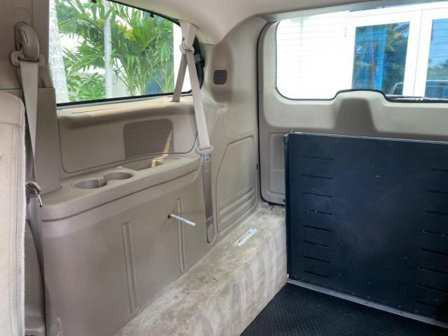 2016 Cashmere/Sandstone Pearlcoat /Dk Frost Beige/Med Beige Chrysler Town and Country REAR DOOR, HANDICAP RAMP LOW MILES 58,632 (2C4RC1BG4GR) with an 3.6L V6 Cylinder Engine engine, Automatic transmission, located at 4701 North Dixie Hwy, Pompano Beach, FL, 33064, (954) 422-2889, 26.240938, -80.123474 - OUR WEBPAGE FLORIDACARS1.COM HAS OVER 100 PHOTOS AND FREE CARFAX LINK 2016 Chrysler Town AND Country Touring Van 3.6L V6 F DOHC 24V Gasoline 25 MPG Front Wheel Drive Features ABS Brakes Air Conditioning Alloy Wheels AM/FM Stereo Automatic Transmission Auxiliary Audio Input Bluetooth Technology CD Au- Photo#68