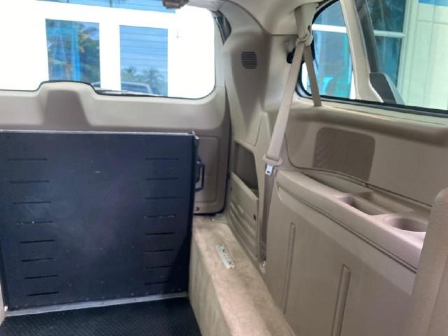 2016 Cashmere/Sandstone Pearlcoat /Dk Frost Beige/Med Beige Chrysler Town and Country REAR DOOR, HANDICAP RAMP LOW MILES 58,632 (2C4RC1BG4GR) with an 3.6L V6 Cylinder Engine engine, Automatic transmission, located at 4701 North Dixie Hwy, Pompano Beach, FL, 33064, (954) 422-2889, 26.240938, -80.123474 - OUR WEBPAGE FLORIDACARS1.COM HAS OVER 100 PHOTOS AND FREE CARFAX LINK 2016 Chrysler Town AND Country Touring Van 3.6L V6 F DOHC 24V Gasoline 25 MPG Front Wheel Drive Features ABS Brakes Air Conditioning Alloy Wheels AM/FM Stereo Automatic Transmission Auxiliary Audio Input Bluetooth Technology CD Au- Photo#69
