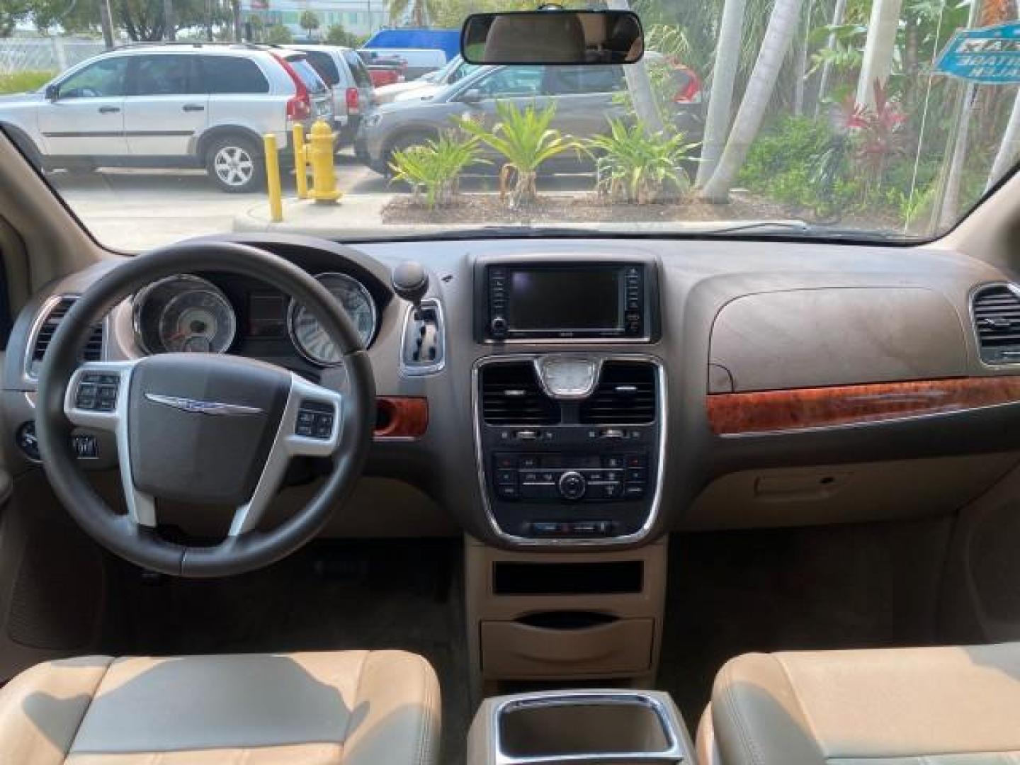 2016 Cashmere/Sandstone Pearlcoat /Dk Frost Beige/Med Beige Chrysler Town and Country REAR DOOR, HANDICAP RAMP LOW MILES 58,632 (2C4RC1BG4GR) with an 3.6L V6 Cylinder Engine engine, Automatic transmission, located at 4701 North Dixie Hwy, Pompano Beach, FL, 33064, (954) 422-2889, 26.240938, -80.123474 - OUR WEBPAGE FLORIDACARS1.COM HAS OVER 100 PHOTOS AND FREE CARFAX LINK 2016 Chrysler Town AND Country Touring Van 3.6L V6 F DOHC 24V Gasoline 25 MPG Front Wheel Drive Features ABS Brakes Air Conditioning Alloy Wheels AM/FM Stereo Automatic Transmission Auxiliary Audio Input Bluetooth Technology CD Au- Photo#73