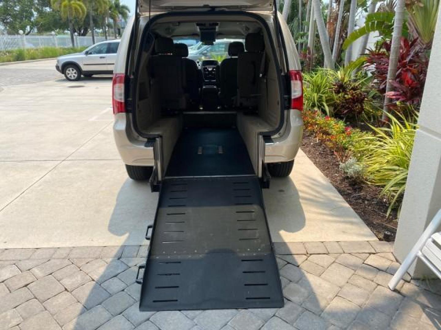 2016 Cashmere/Sandstone Pearlcoat /Dk Frost Beige/Med Beige Chrysler Town and Country REAR DOOR, HANDICAP RAMP LOW MILES 58,632 (2C4RC1BG4GR) with an 3.6L V6 Cylinder Engine engine, Automatic transmission, located at 4701 North Dixie Hwy, Pompano Beach, FL, 33064, (954) 422-2889, 26.240938, -80.123474 - OUR WEBPAGE FLORIDACARS1.COM HAS OVER 100 PHOTOS AND FREE CARFAX LINK 2016 Chrysler Town AND Country Touring Van 3.6L V6 F DOHC 24V Gasoline 25 MPG Front Wheel Drive Features ABS Brakes Air Conditioning Alloy Wheels AM/FM Stereo Automatic Transmission Auxiliary Audio Input Bluetooth Technology CD Au- Photo#88