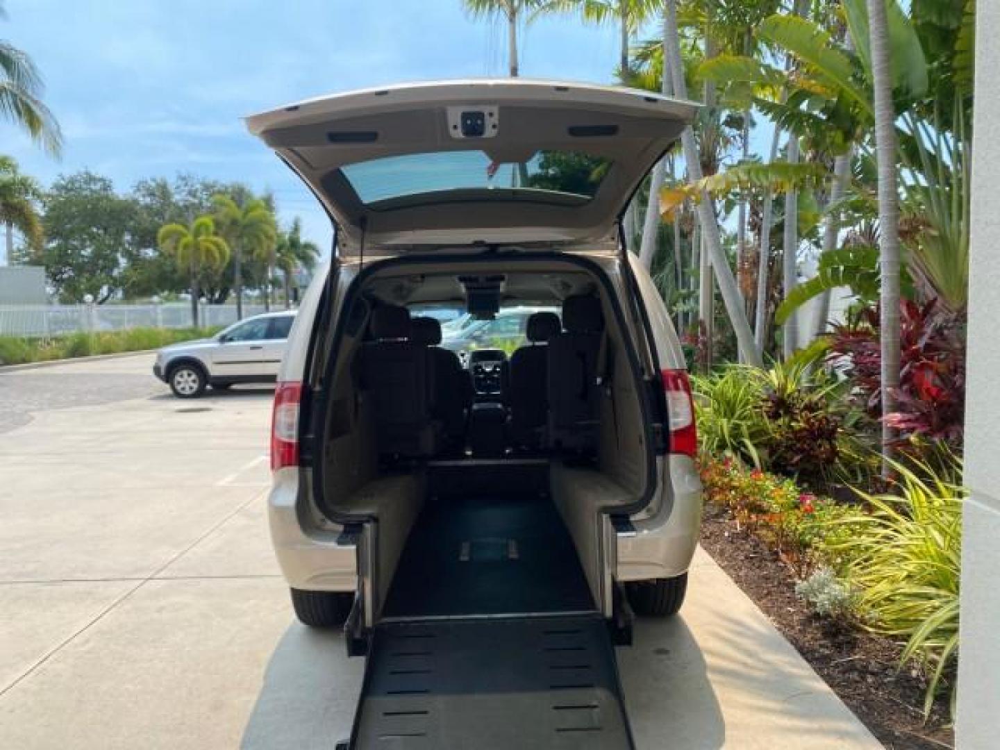 2016 Cashmere/Sandstone Pearlcoat /Dk Frost Beige/Med Beige Chrysler Town and Country REAR DOOR, HANDICAP RAMP LOW MILES 58,632 (2C4RC1BG4GR) with an 3.6L V6 Cylinder Engine engine, Automatic transmission, located at 4701 North Dixie Hwy, Pompano Beach, FL, 33064, (954) 422-2889, 26.240938, -80.123474 - OUR WEBPAGE FLORIDACARS1.COM HAS OVER 100 PHOTOS AND FREE CARFAX LINK 2016 Chrysler Town AND Country Touring Van 3.6L V6 F DOHC 24V Gasoline 25 MPG Front Wheel Drive Features ABS Brakes Air Conditioning Alloy Wheels AM/FM Stereo Automatic Transmission Auxiliary Audio Input Bluetooth Technology CD Au- Photo#89