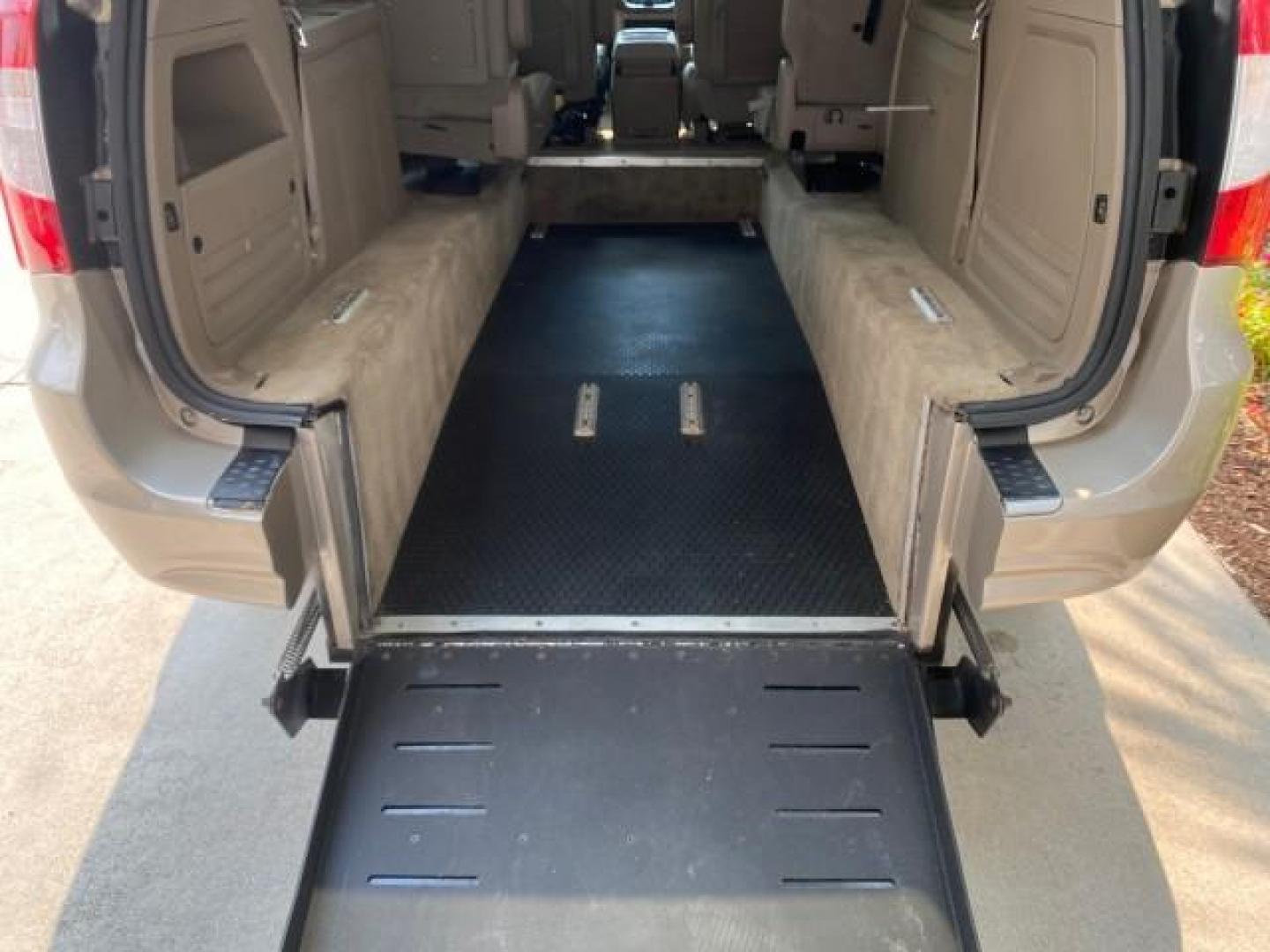 2016 Cashmere/Sandstone Pearlcoat /Dk Frost Beige/Med Beige Chrysler Town and Country REAR DOOR, HANDICAP RAMP LOW MILES 58,632 (2C4RC1BG4GR) with an 3.6L V6 Cylinder Engine engine, Automatic transmission, located at 4701 North Dixie Hwy, Pompano Beach, FL, 33064, (954) 422-2889, 26.240938, -80.123474 - OUR WEBPAGE FLORIDACARS1.COM HAS OVER 100 PHOTOS AND FREE CARFAX LINK 2016 Chrysler Town AND Country Touring Van 3.6L V6 F DOHC 24V Gasoline 25 MPG Front Wheel Drive Features ABS Brakes Air Conditioning Alloy Wheels AM/FM Stereo Automatic Transmission Auxiliary Audio Input Bluetooth Technology CD Au- Photo#92