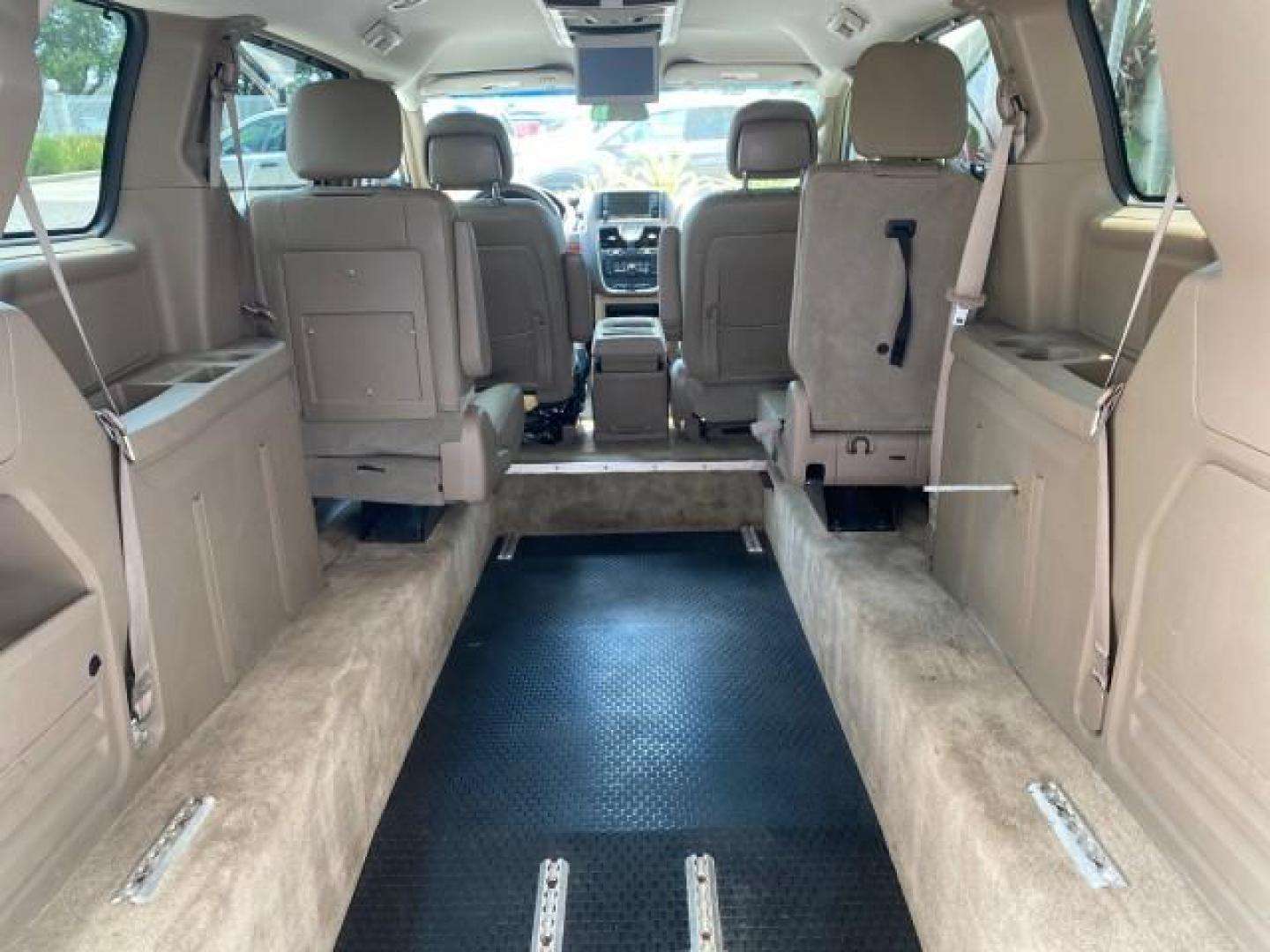 2016 Cashmere/Sandstone Pearlcoat /Dk Frost Beige/Med Beige Chrysler Town and Country REAR DOOR, HANDICAP RAMP LOW MILES 58,632 (2C4RC1BG4GR) with an 3.6L V6 Cylinder Engine engine, Automatic transmission, located at 4701 North Dixie Hwy, Pompano Beach, FL, 33064, (954) 422-2889, 26.240938, -80.123474 - OUR WEBPAGE FLORIDACARS1.COM HAS OVER 100 PHOTOS AND FREE CARFAX LINK 2016 Chrysler Town AND Country Touring Van 3.6L V6 F DOHC 24V Gasoline 25 MPG Front Wheel Drive Features ABS Brakes Air Conditioning Alloy Wheels AM/FM Stereo Automatic Transmission Auxiliary Audio Input Bluetooth Technology CD Au- Photo#94