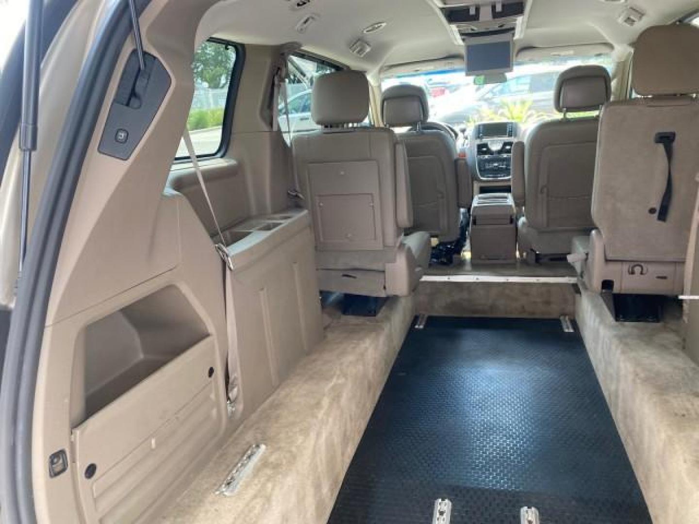 2016 Cashmere/Sandstone Pearlcoat /Dk Frost Beige/Med Beige Chrysler Town and Country REAR DOOR, HANDICAP RAMP LOW MILES 58,632 (2C4RC1BG4GR) with an 3.6L V6 Cylinder Engine engine, Automatic transmission, located at 4701 North Dixie Hwy, Pompano Beach, FL, 33064, (954) 422-2889, 26.240938, -80.123474 - OUR WEBPAGE FLORIDACARS1.COM HAS OVER 100 PHOTOS AND FREE CARFAX LINK 2016 Chrysler Town AND Country Touring Van 3.6L V6 F DOHC 24V Gasoline 25 MPG Front Wheel Drive Features ABS Brakes Air Conditioning Alloy Wheels AM/FM Stereo Automatic Transmission Auxiliary Audio Input Bluetooth Technology CD Au- Photo#95