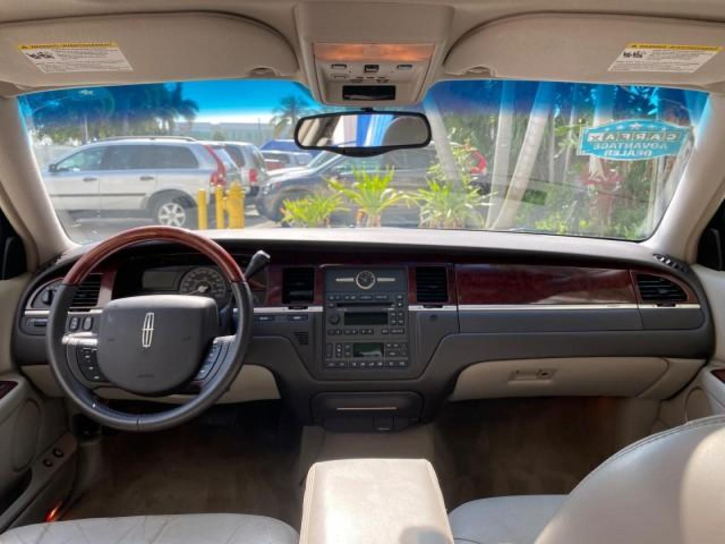 2005 Light French Silk Metallic /Med/Lt Parchment Lincoln Town Car Signature Limited LOW MILES 84,448 (1LNHM82W55Y) with an 4.6L SOHC SMPI V8 Engine engine, Automatic transmission, located at 4701 North Dixie Hwy, Pompano Beach, FL, 33064, (954) 422-2889, 26.240938, -80.123474 - OUR WEBPAGE FLORIDACARS1.COM HAS OVER 100 PHOTOS AND FREE CARFAX LINK 2005 Lincoln Town Car Signature Limited Sedan 4 DR 4.6L V8 F OHV 16V Gasoline 25 MPG Rear Wheel Drive Features ABS Brakes Air Conditioning Alloy Wheels AM/FM Stereo Audiophile Sound System Automatic Transmission Cassette Player CD- Photo#92