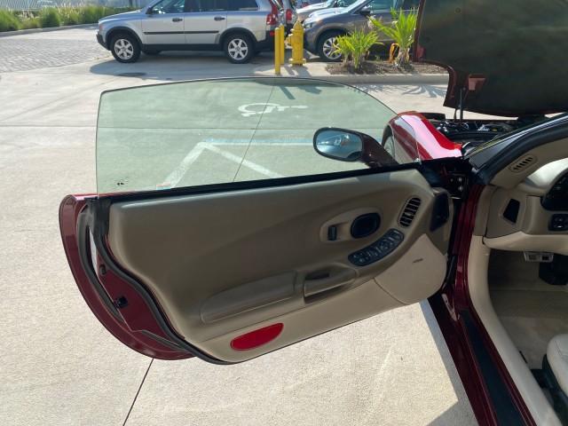 2003 50th Anniversary Red /Light Oak Chevrolet Corvette 50TH CONVERTIBLE LOW MILES 6,742 (1G1YY32G735) with an 5.7L Ls1 V8 SFI Engine engine, Automatic transmission, located at 4701 North Dixie Hwy, Pompano Beach, FL, 33064, (954) 422-2889, 26.240938, -80.123474 - OUR WEBPAGE FLORIDACARS1.COM HAS OVER 100 PHOTOS AND FREE CARFAX LINK 2003 Chevrolet Corvette 50th Anniversary Convertible 5.7L V8 F OHV Gasoline 25 MPG Rear Wheel Drive Features ABS Brakes Air Conditioning Alloy Wheels AM/FM Stereo Automatic Transmission BOSE Sound System CD Audio Cruise Control He- Photo#9