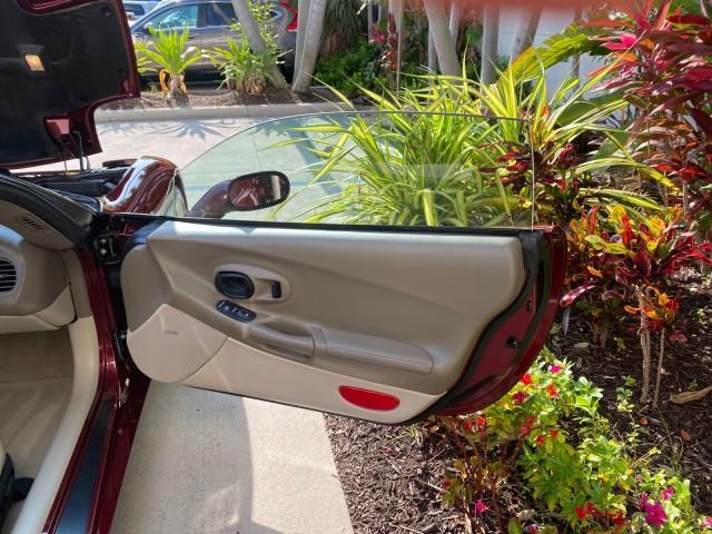 2003 50th Anniversary Red /Light Oak Chevrolet Corvette 50TH CONVERTIBLE LOW MILES 6,742 (1G1YY32G735) with an 5.7L Ls1 V8 SFI Engine engine, Automatic transmission, located at 4701 North Dixie Hwy, Pompano Beach, FL, 33064, (954) 422-2889, 26.240938, -80.123474 - OUR WEBPAGE FLORIDACARS1.COM HAS OVER 100 PHOTOS AND FREE CARFAX LINK 2003 Chevrolet Corvette 50th Anniversary Convertible 5.7L V8 F OHV Gasoline 25 MPG Rear Wheel Drive Features ABS Brakes Air Conditioning Alloy Wheels AM/FM Stereo Automatic Transmission BOSE Sound System CD Audio Cruise Control He- Photo#11