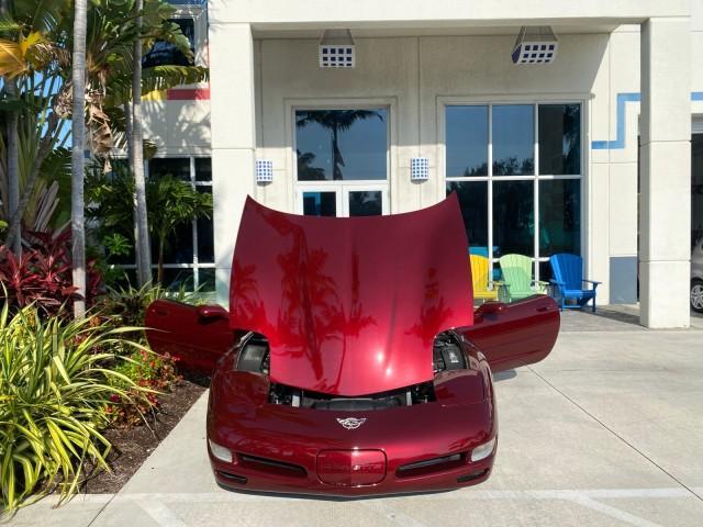 2003 50th Anniversary Red /Light Oak Chevrolet Corvette 50TH CONVERTIBLE LOW MILES 6,742 (1G1YY32G735) with an 5.7L Ls1 V8 SFI Engine engine, Automatic transmission, located at 4701 North Dixie Hwy, Pompano Beach, FL, 33064, (954) 422-2889, 26.240938, -80.123474 - OUR WEBPAGE FLORIDACARS1.COM HAS OVER 100 PHOTOS AND FREE CARFAX LINK 2003 Chevrolet Corvette 50th Anniversary Convertible 5.7L V8 F OHV Gasoline 25 MPG Rear Wheel Drive Features ABS Brakes Air Conditioning Alloy Wheels AM/FM Stereo Automatic Transmission BOSE Sound System CD Audio Cruise Control He- Photo#16