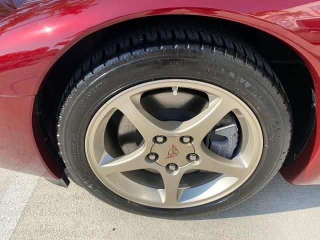 2003 50th Anniversary Red /Light Oak Chevrolet Corvette 50TH CONVERTIBLE LOW MILES 6,742 (1G1YY32G735) with an 5.7L Ls1 V8 SFI Engine engine, Automatic transmission, located at 4701 North Dixie Hwy, Pompano Beach, FL, 33064, (954) 422-2889, 26.240938, -80.123474 - OUR WEBPAGE FLORIDACARS1.COM HAS OVER 100 PHOTOS AND FREE CARFAX LINK 2003 Chevrolet Corvette 50th Anniversary Convertible 5.7L V8 F OHV Gasoline 25 MPG Rear Wheel Drive Features ABS Brakes Air Conditioning Alloy Wheels AM/FM Stereo Automatic Transmission BOSE Sound System CD Audio Cruise Control He- Photo#19