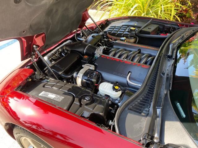 2003 50th Anniversary Red /Light Oak Chevrolet Corvette 50TH CONVERTIBLE LOW MILES 6,742 (1G1YY32G735) with an 5.7L Ls1 V8 SFI Engine engine, Automatic transmission, located at 4701 North Dixie Hwy, Pompano Beach, FL, 33064, (954) 422-2889, 26.240938, -80.123474 - OUR WEBPAGE FLORIDACARS1.COM HAS OVER 100 PHOTOS AND FREE CARFAX LINK 2003 Chevrolet Corvette 50th Anniversary Convertible 5.7L V8 F OHV Gasoline 25 MPG Rear Wheel Drive Features ABS Brakes Air Conditioning Alloy Wheels AM/FM Stereo Automatic Transmission BOSE Sound System CD Audio Cruise Control He- Photo#24