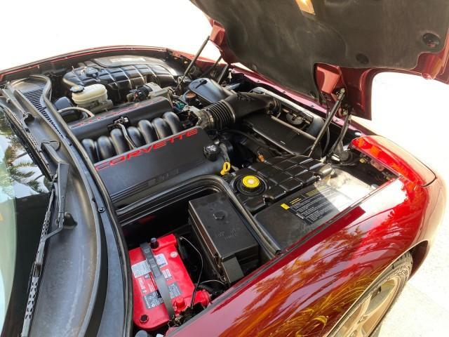 2003 50th Anniversary Red /Light Oak Chevrolet Corvette 50TH CONVERTIBLE LOW MILES 6,742 (1G1YY32G735) with an 5.7L Ls1 V8 SFI Engine engine, Automatic transmission, located at 4701 North Dixie Hwy, Pompano Beach, FL, 33064, (954) 422-2889, 26.240938, -80.123474 - OUR WEBPAGE FLORIDACARS1.COM HAS OVER 100 PHOTOS AND FREE CARFAX LINK 2003 Chevrolet Corvette 50th Anniversary Convertible 5.7L V8 F OHV Gasoline 25 MPG Rear Wheel Drive Features ABS Brakes Air Conditioning Alloy Wheels AM/FM Stereo Automatic Transmission BOSE Sound System CD Audio Cruise Control He- Photo#25