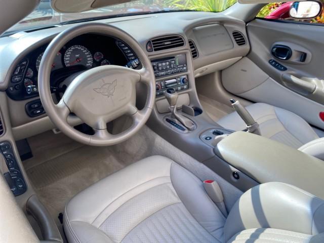 2003 50th Anniversary Red /Light Oak Chevrolet Corvette 50TH CONVERTIBLE LOW MILES 6,742 (1G1YY32G735) with an 5.7L Ls1 V8 SFI Engine engine, Automatic transmission, located at 4701 North Dixie Hwy, Pompano Beach, FL, 33064, (954) 422-2889, 26.240938, -80.123474 - OUR WEBPAGE FLORIDACARS1.COM HAS OVER 100 PHOTOS AND FREE CARFAX LINK 2003 Chevrolet Corvette 50th Anniversary Convertible 5.7L V8 F OHV Gasoline 25 MPG Rear Wheel Drive Features ABS Brakes Air Conditioning Alloy Wheels AM/FM Stereo Automatic Transmission BOSE Sound System CD Audio Cruise Control He- Photo#50