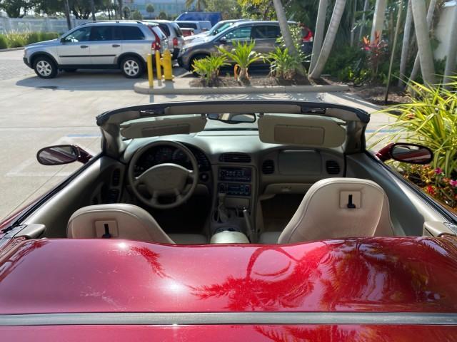 2003 50th Anniversary Red /Light Oak Chevrolet Corvette 50TH CONVERTIBLE LOW MILES 6,742 (1G1YY32G735) with an 5.7L Ls1 V8 SFI Engine engine, Automatic transmission, located at 4701 North Dixie Hwy, Pompano Beach, FL, 33064, (954) 422-2889, 26.240938, -80.123474 - OUR WEBPAGE FLORIDACARS1.COM HAS OVER 100 PHOTOS AND FREE CARFAX LINK 2003 Chevrolet Corvette 50th Anniversary Convertible 5.7L V8 F OHV Gasoline 25 MPG Rear Wheel Drive Features ABS Brakes Air Conditioning Alloy Wheels AM/FM Stereo Automatic Transmission BOSE Sound System CD Audio Cruise Control He- Photo#54