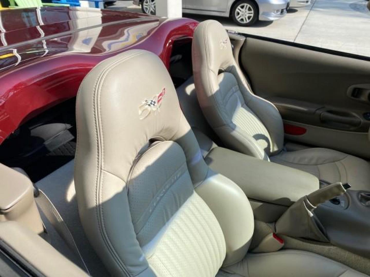 2003 50th Anniversary Red /Light Oak Chevrolet Corvette 50TH CONVERTIBLE LOW MILES 6,742 (1G1YY32G735) with an 5.7L Ls1 V8 SFI Engine engine, Automatic transmission, located at 4701 North Dixie Hwy, Pompano Beach, FL, 33064, (954) 422-2889, 26.240938, -80.123474 - OUR WEBPAGE FLORIDACARS1.COM HAS OVER 100 PHOTOS AND FREE CARFAX LINK 2003 Chevrolet Corvette 50th Anniversary Convertible 5.7L V8 F OHV Gasoline 25 MPG Rear Wheel Drive Features ABS Brakes Air Conditioning Alloy Wheels AM/FM Stereo Automatic Transmission BOSE Sound System CD Audio Cruise Control He- Photo#57