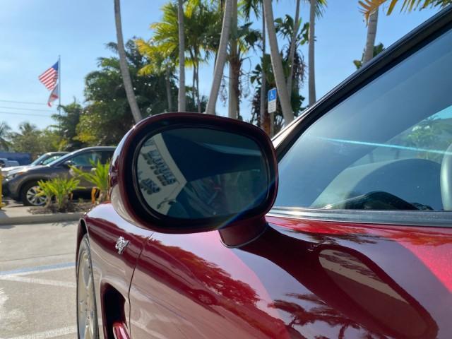 2003 50th Anniversary Red /Light Oak Chevrolet Corvette 50TH CONVERTIBLE LOW MILES 6,742 (1G1YY32G735) with an 5.7L Ls1 V8 SFI Engine engine, Automatic transmission, located at 4701 North Dixie Hwy, Pompano Beach, FL, 33064, (954) 422-2889, 26.240938, -80.123474 - OUR WEBPAGE FLORIDACARS1.COM HAS OVER 100 PHOTOS AND FREE CARFAX LINK 2003 Chevrolet Corvette 50th Anniversary Convertible 5.7L V8 F OHV Gasoline 25 MPG Rear Wheel Drive Features ABS Brakes Air Conditioning Alloy Wheels AM/FM Stereo Automatic Transmission BOSE Sound System CD Audio Cruise Control He- Photo#61