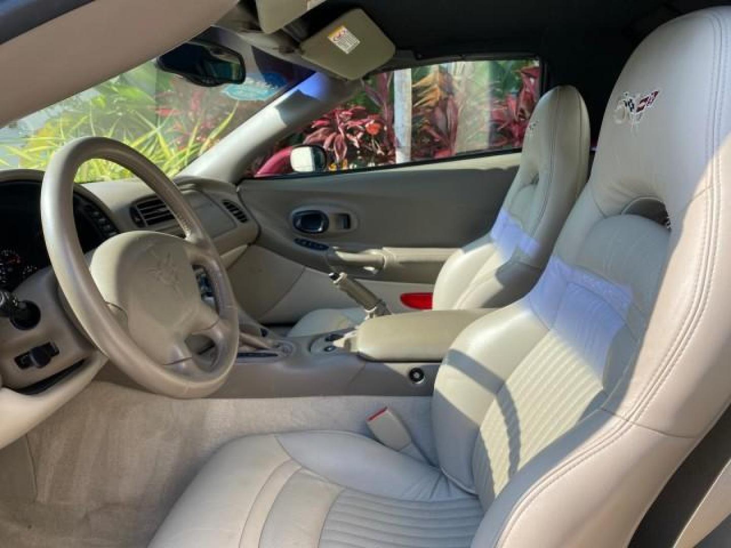 2003 50th Anniversary Red /Light Oak Chevrolet Corvette 50TH CONVERTIBLE LOW MILES 6,742 (1G1YY32G735) with an 5.7L Ls1 V8 SFI Engine engine, Automatic transmission, located at 4701 North Dixie Hwy, Pompano Beach, FL, 33064, (954) 422-2889, 26.240938, -80.123474 - OUR WEBPAGE FLORIDACARS1.COM HAS OVER 100 PHOTOS AND FREE CARFAX LINK 2003 Chevrolet Corvette 50th Anniversary Convertible 5.7L V8 F OHV Gasoline 25 MPG Rear Wheel Drive Features ABS Brakes Air Conditioning Alloy Wheels AM/FM Stereo Automatic Transmission BOSE Sound System CD Audio Cruise Control He- Photo#68